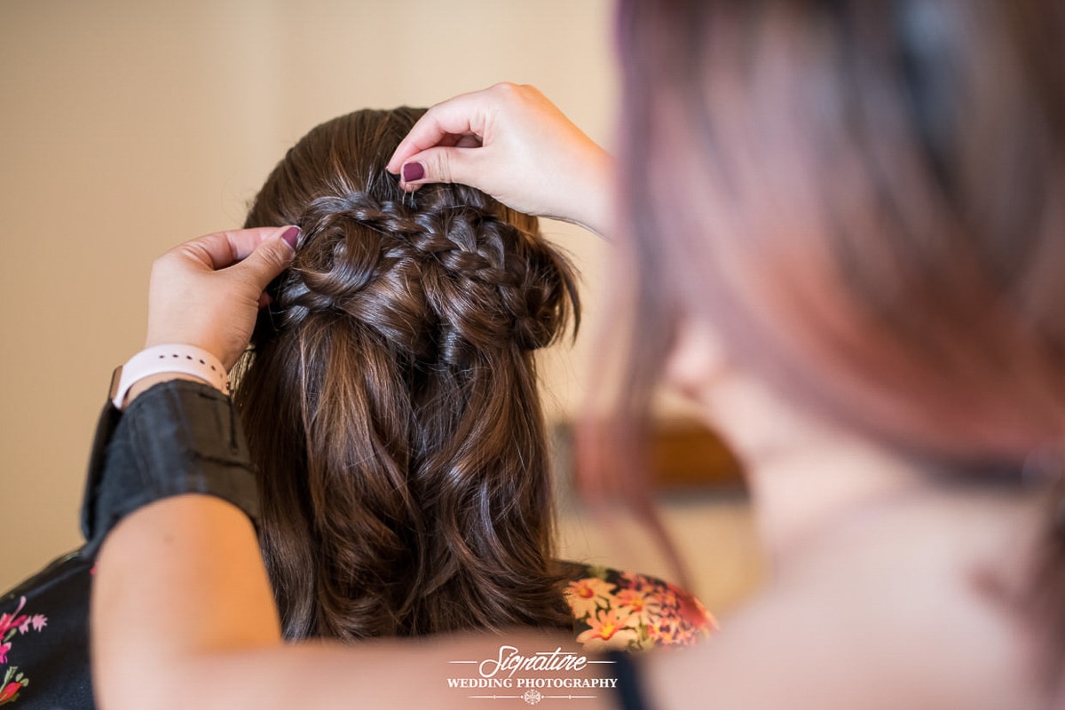 Back of bride's hair getting done