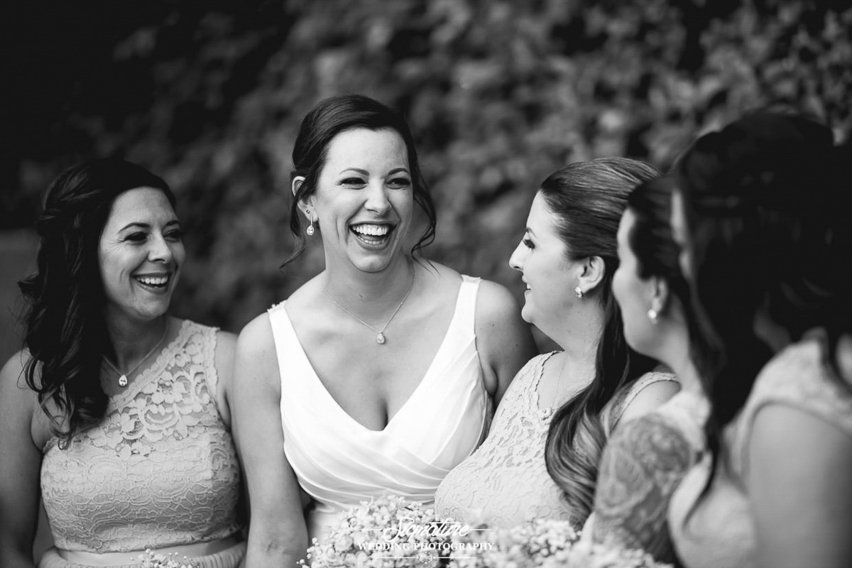 Bride and bridesmaids candid black and white