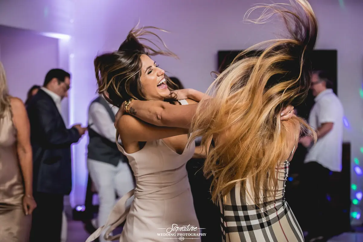 Wedding guests dancing at reception
