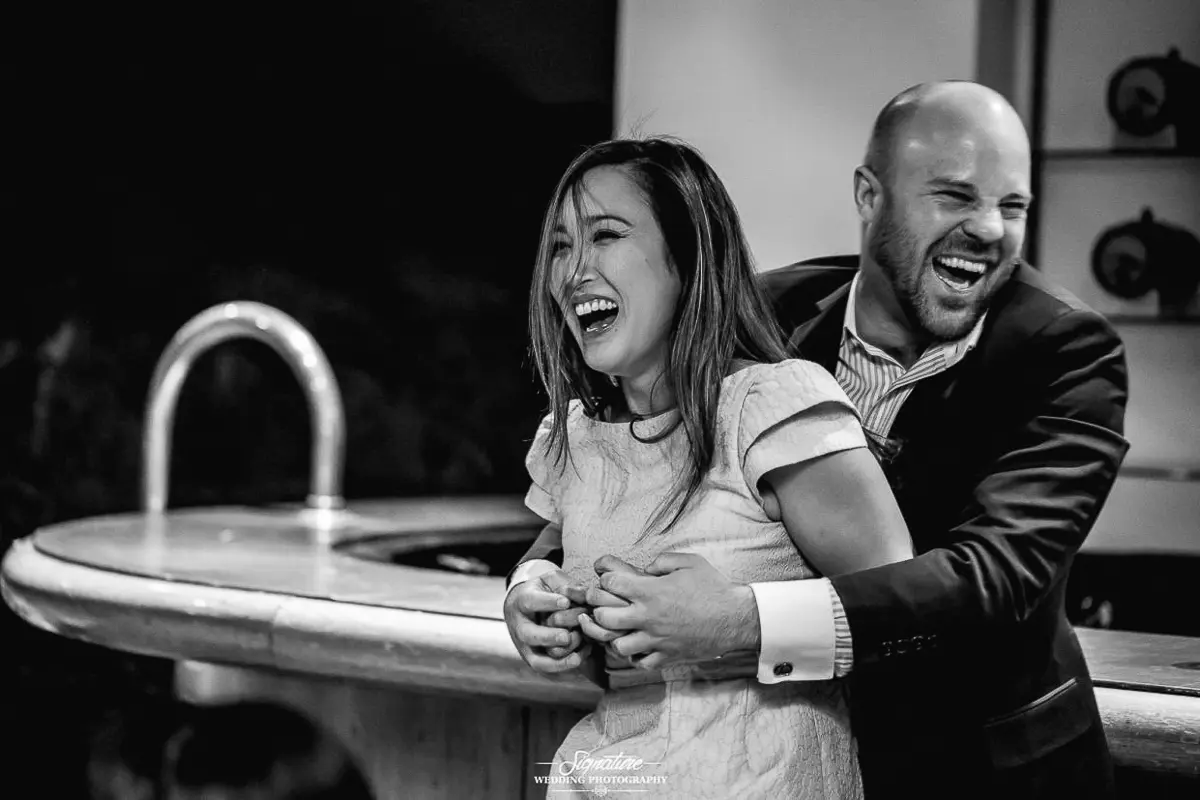 Couple laughing black and white candid