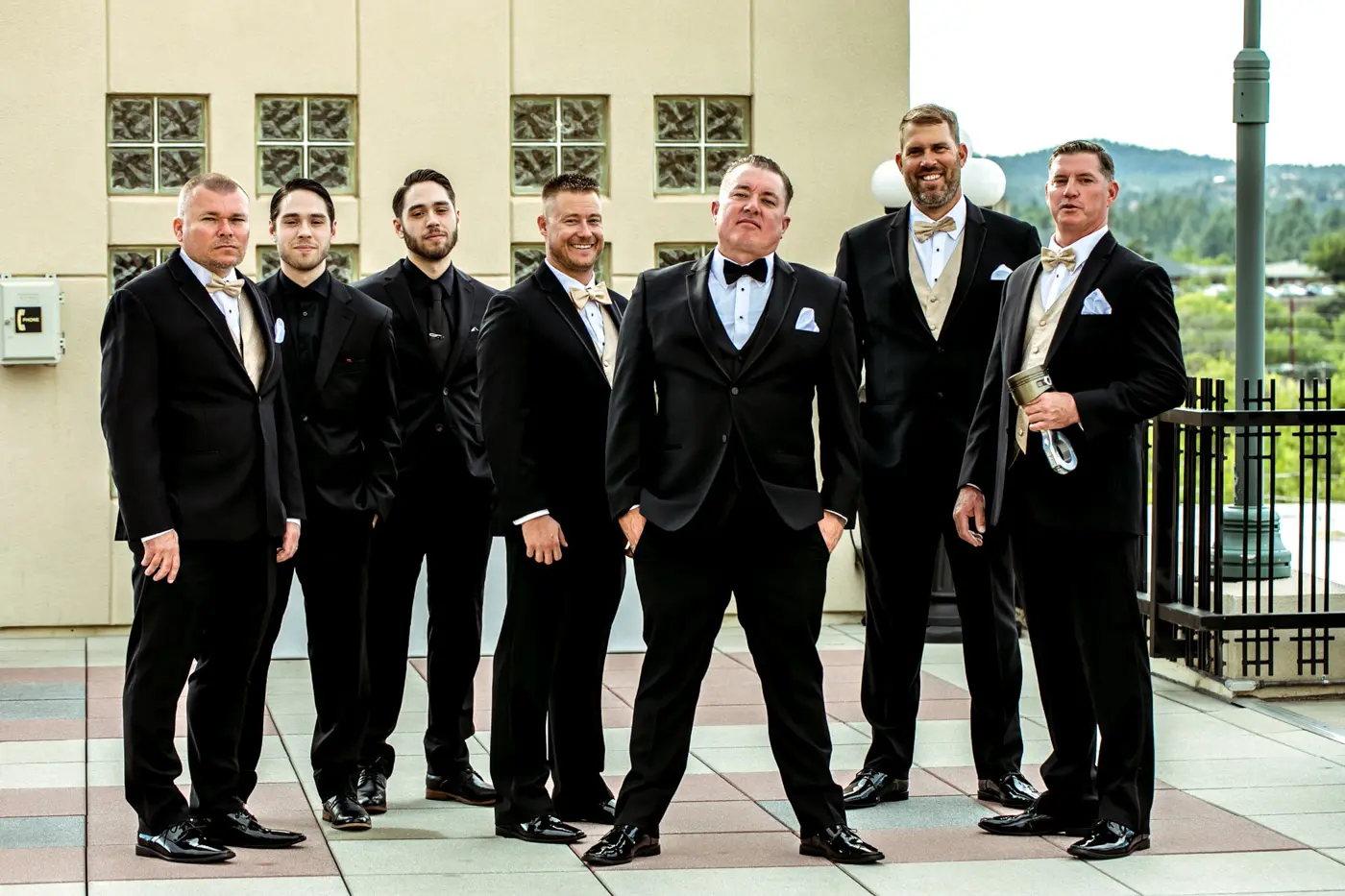 Groom with groomsmen on balcony