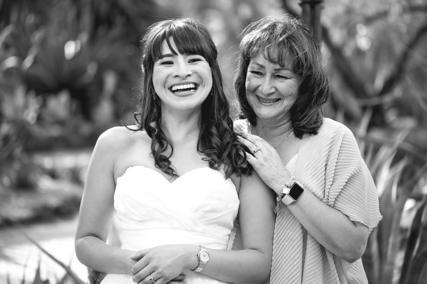 Mother and bride smiling black and white
