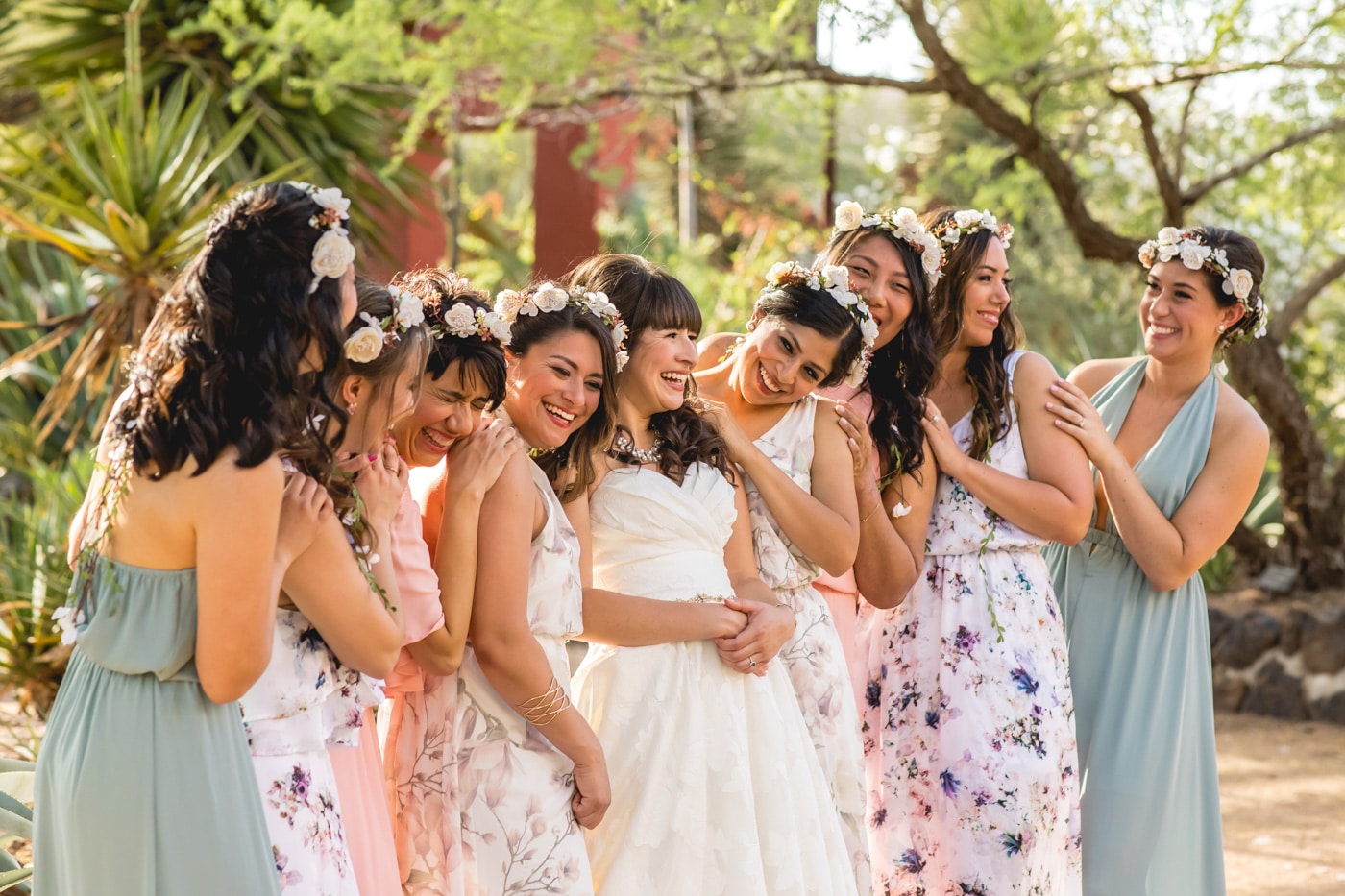Bride and bridesmaids smiling together