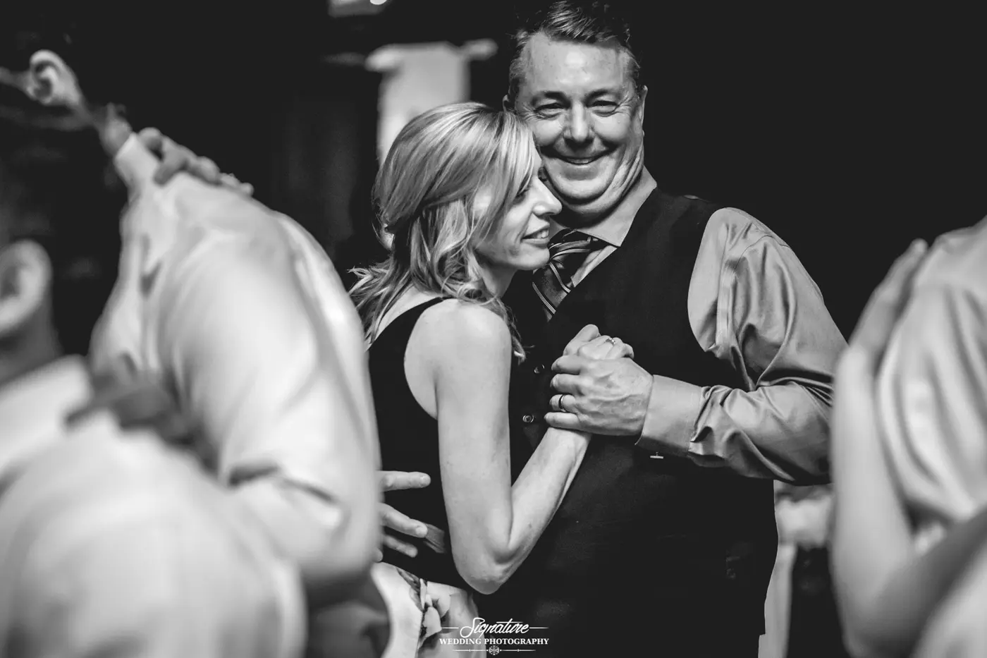 Wedding guests dancing black and white