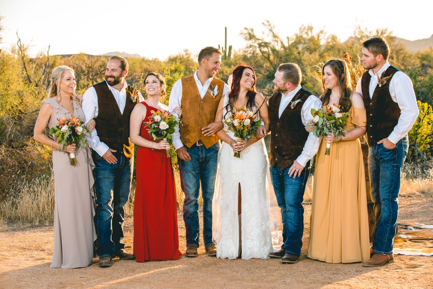 Bride and groom with wedding party in desert