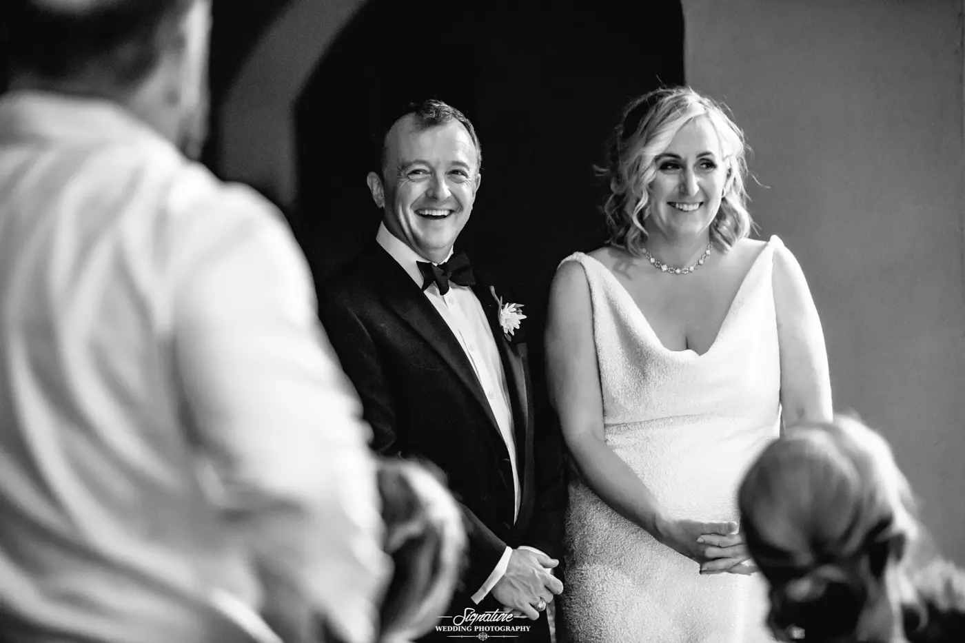 Parents smiling black and white candid