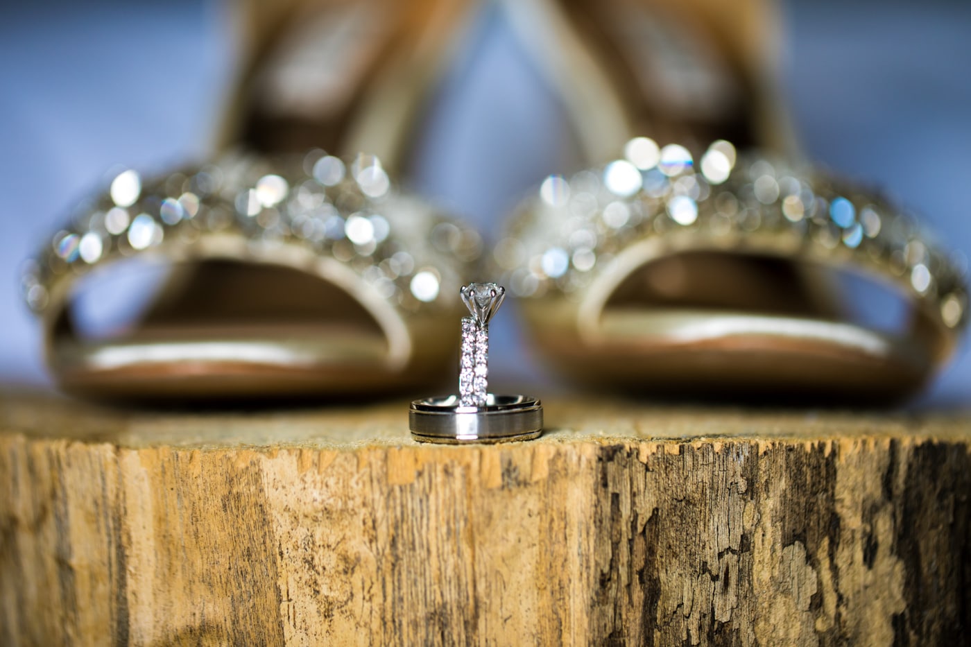 Detail shot of wedding shoes and rings
