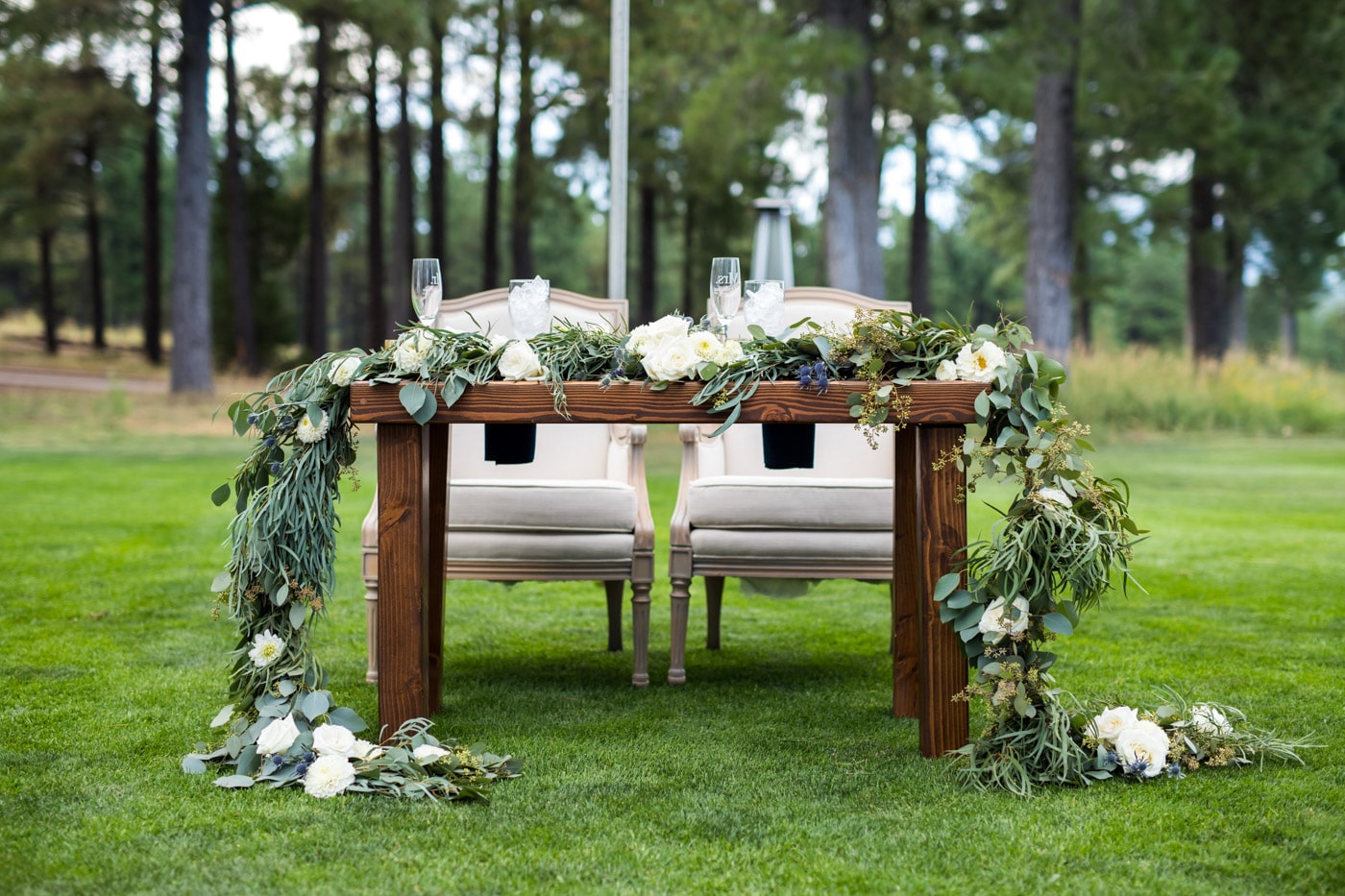 Sweetheart table with flowers