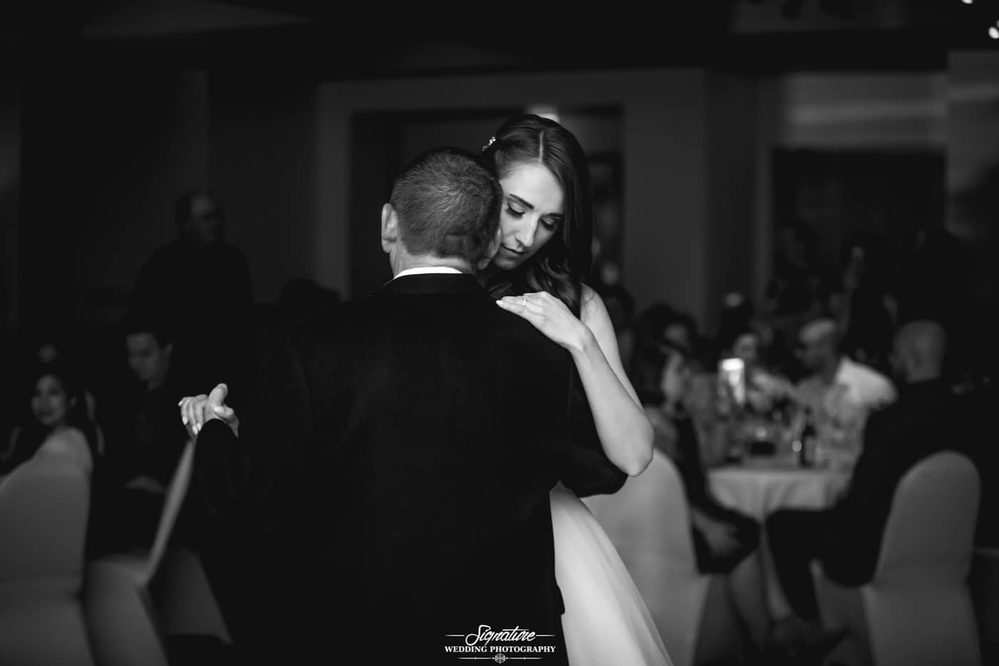 Father and daughter dance black and white