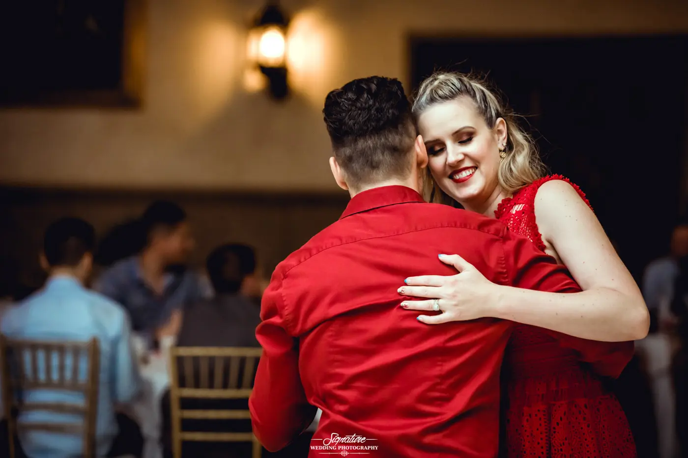 Wedding guests dancing together