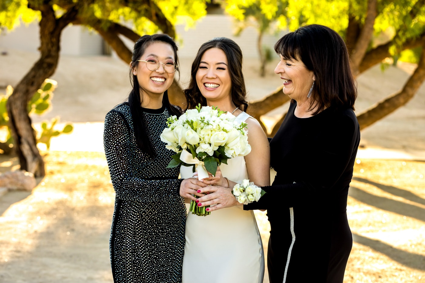 Bride and women in family smiling