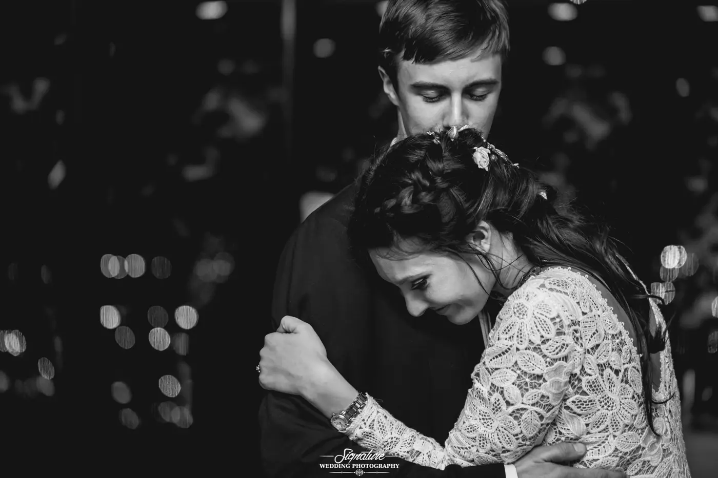 Bride and groom dancing black and white