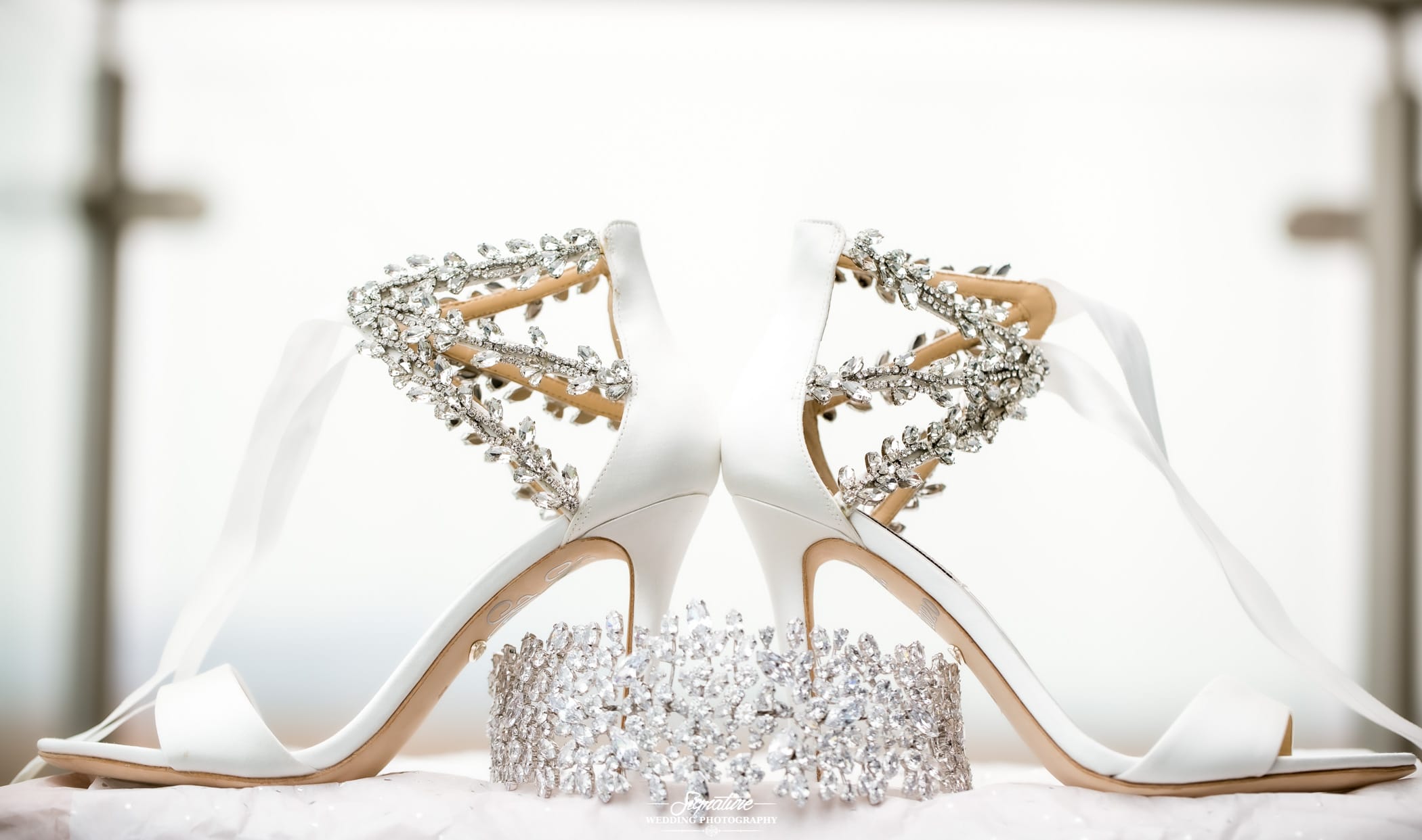 Close up of bridal shoes and jewelry