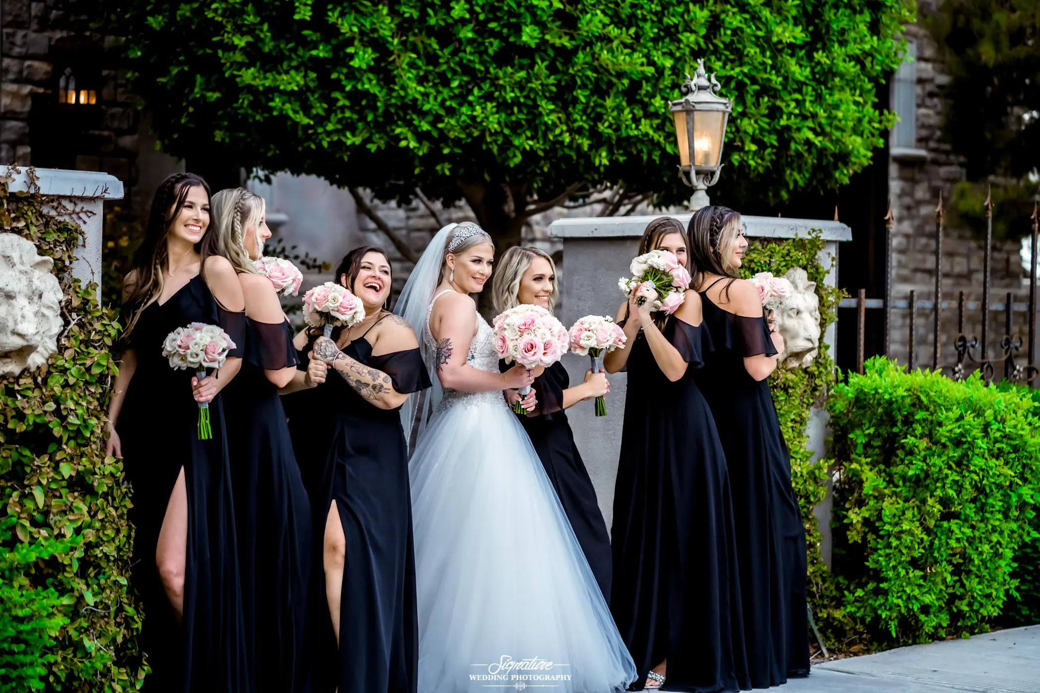Bride and bridesmaids fun pose