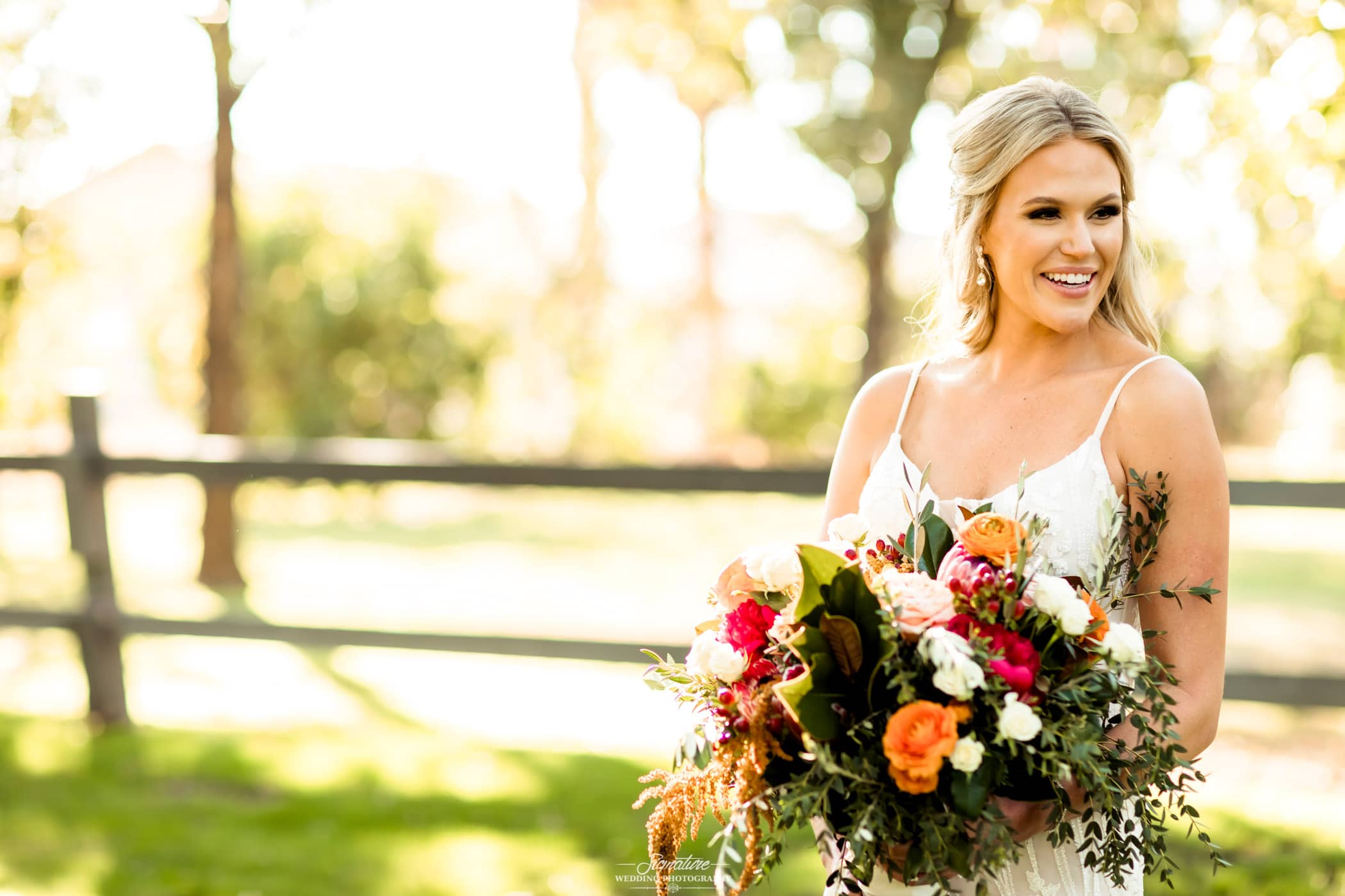 Bride with bouquet smiling