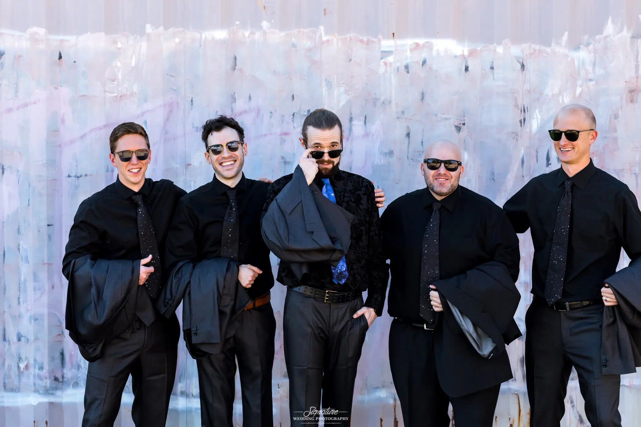 Groom and groomsmen with sunglasses