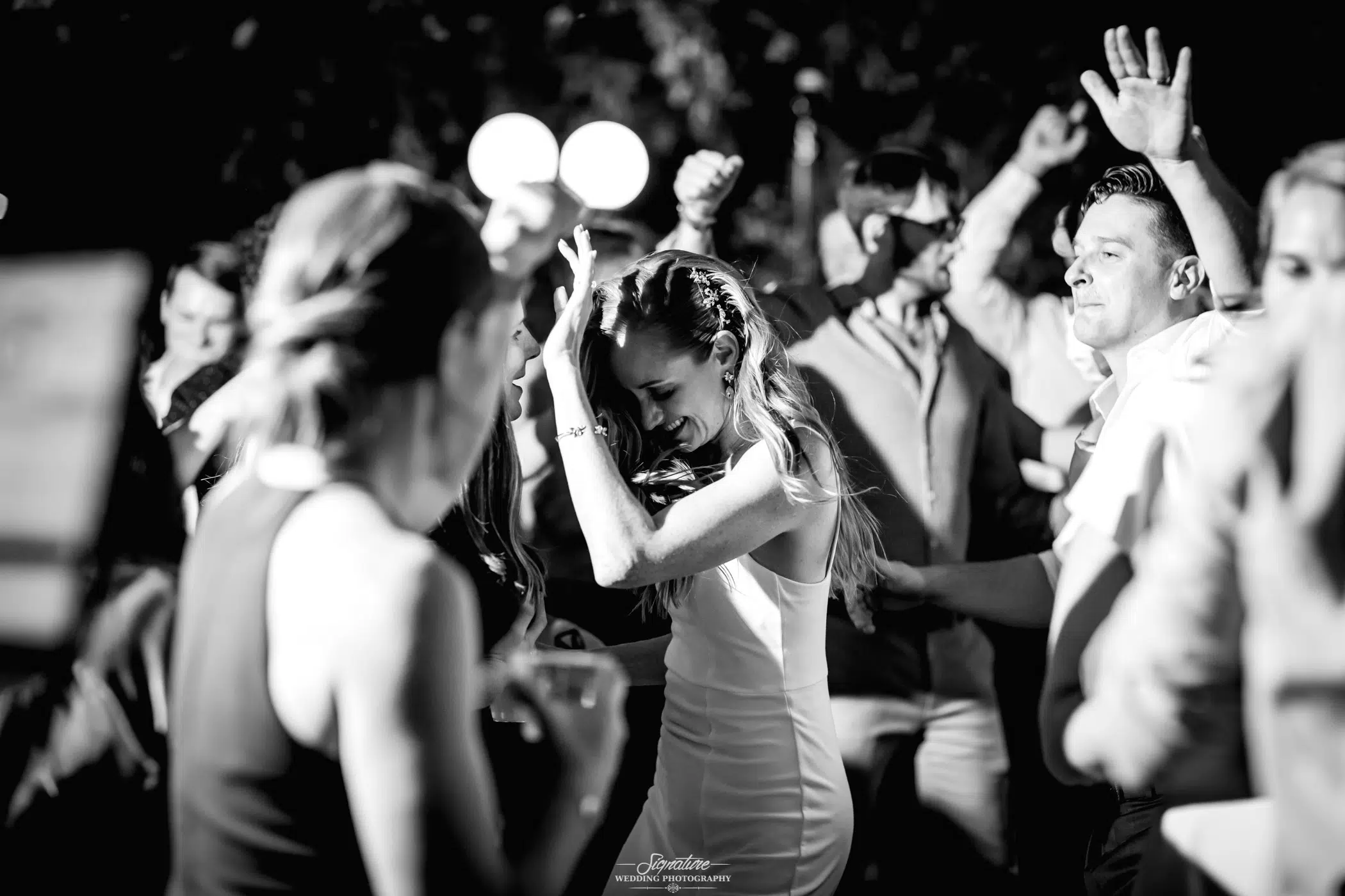 Bride and groom dancing candid black and white