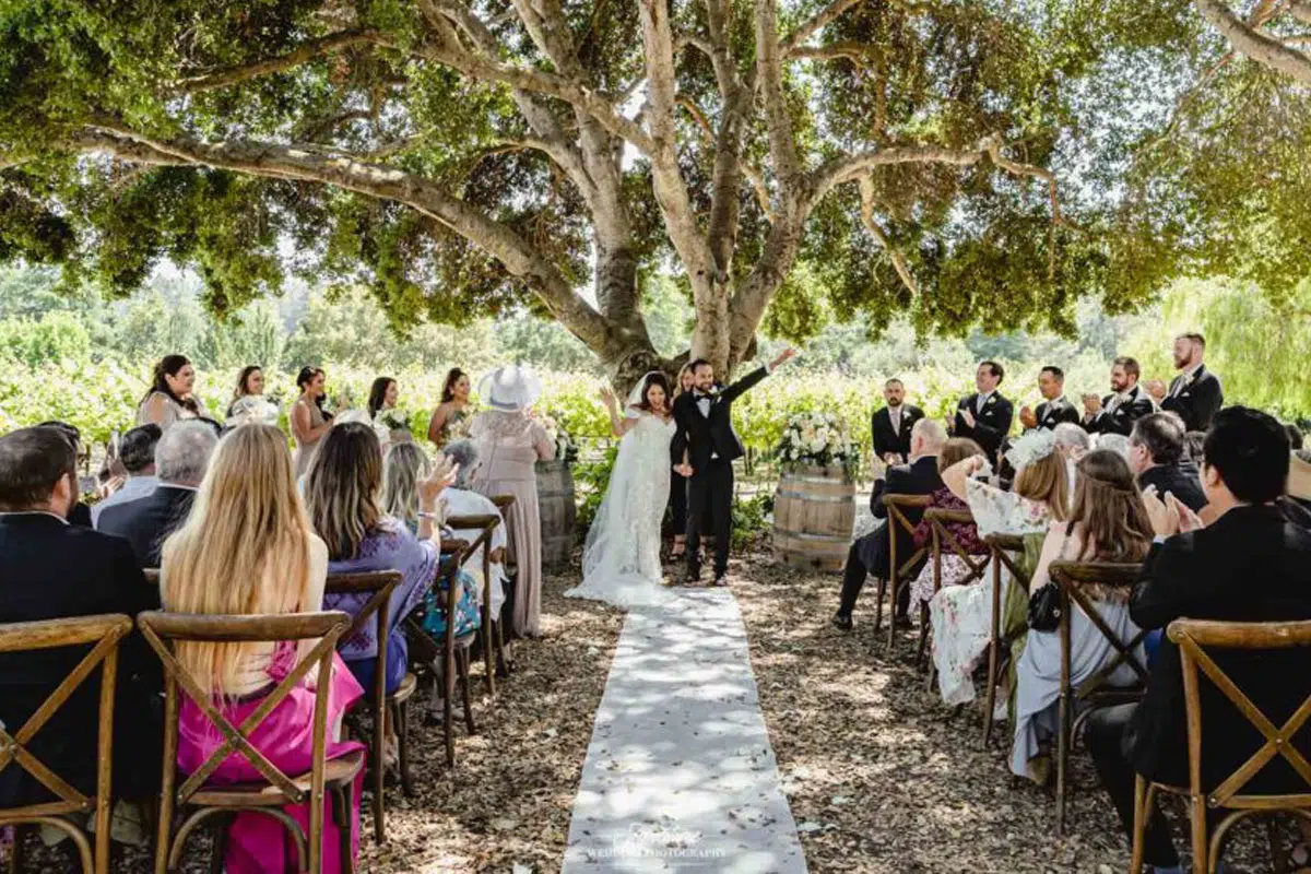 Bride and groom celebrating during ceremony