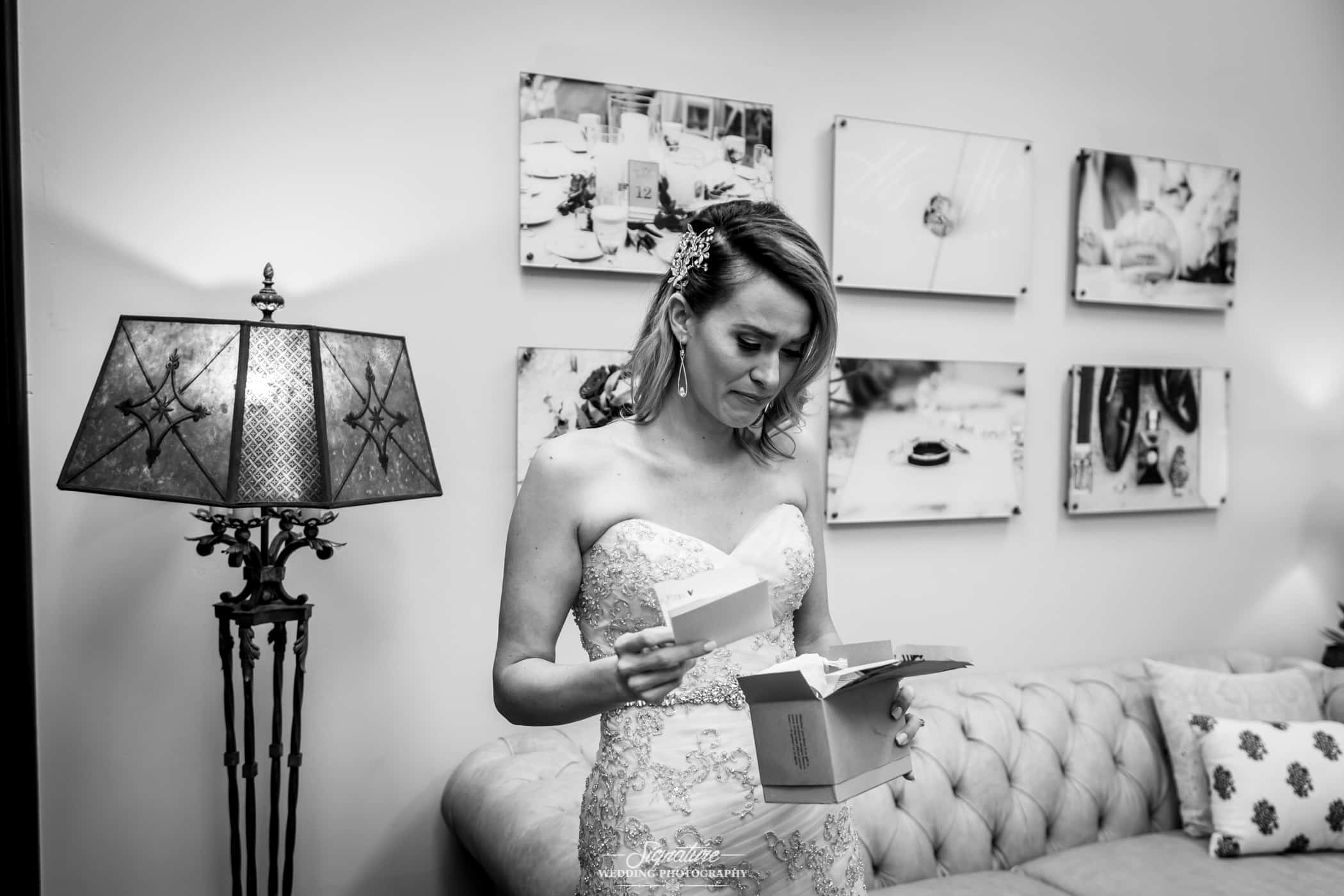 Bride emotional opening gift black and white