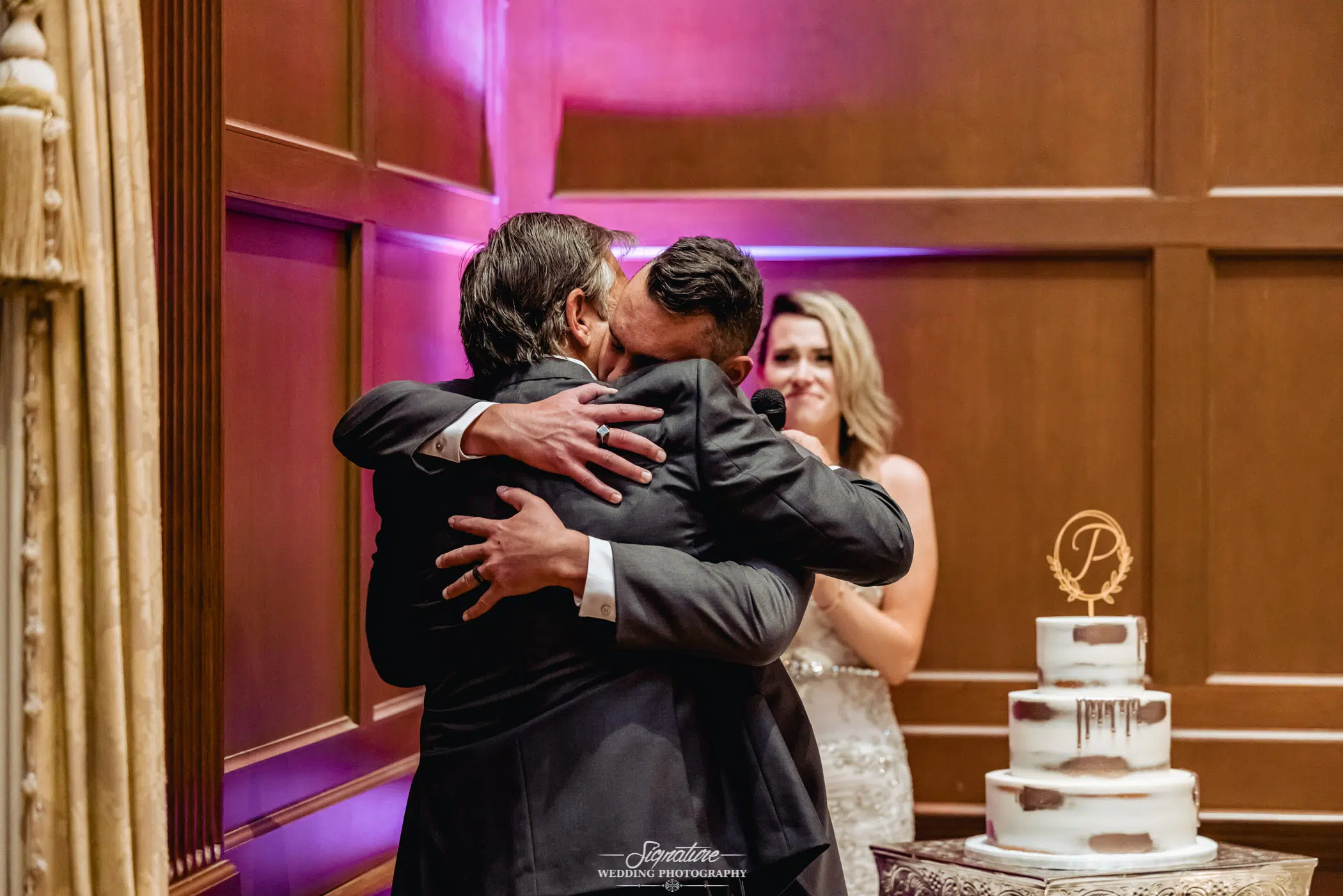 Groom hugging patriarch
