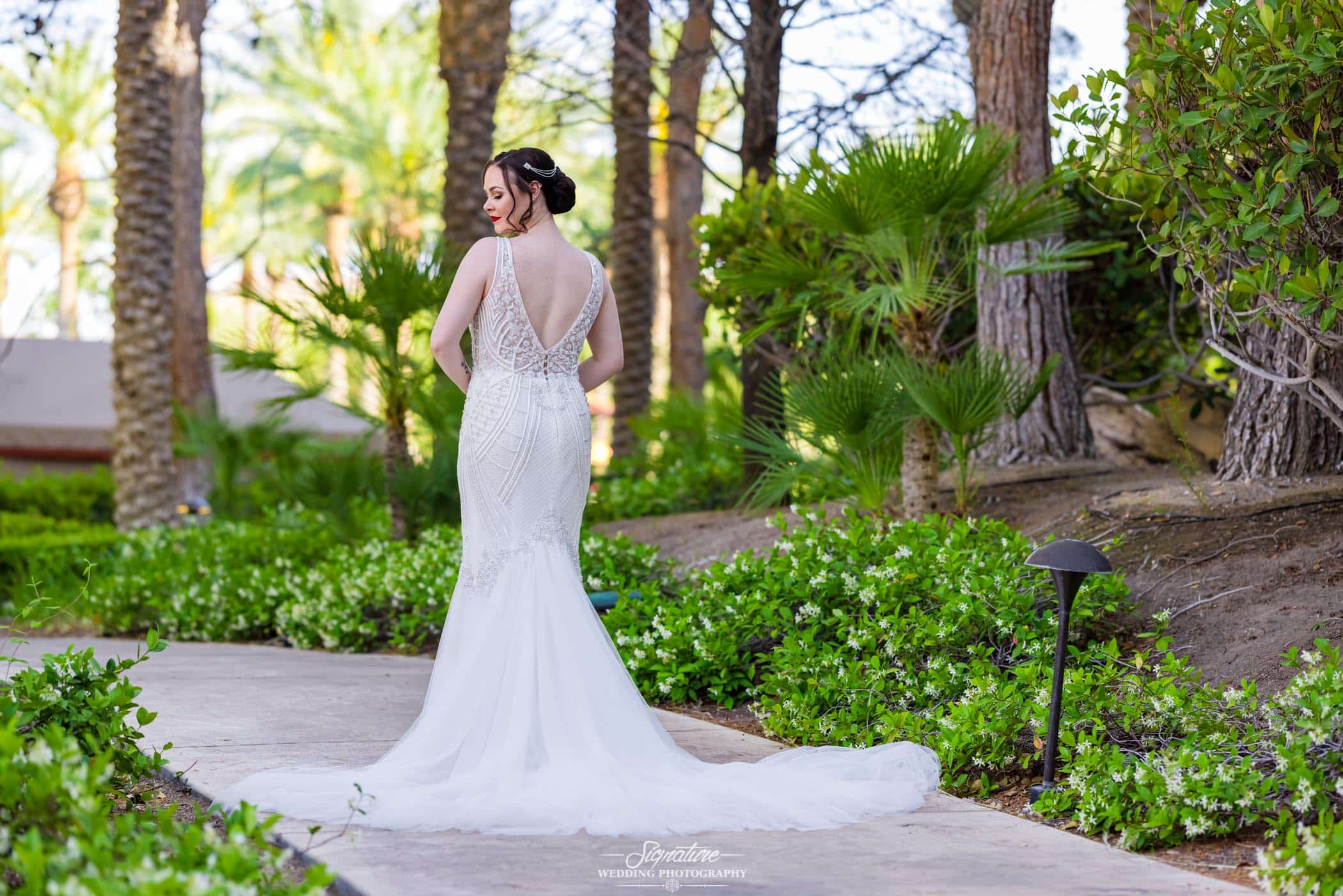 Back of bride's dress looking over shoulder