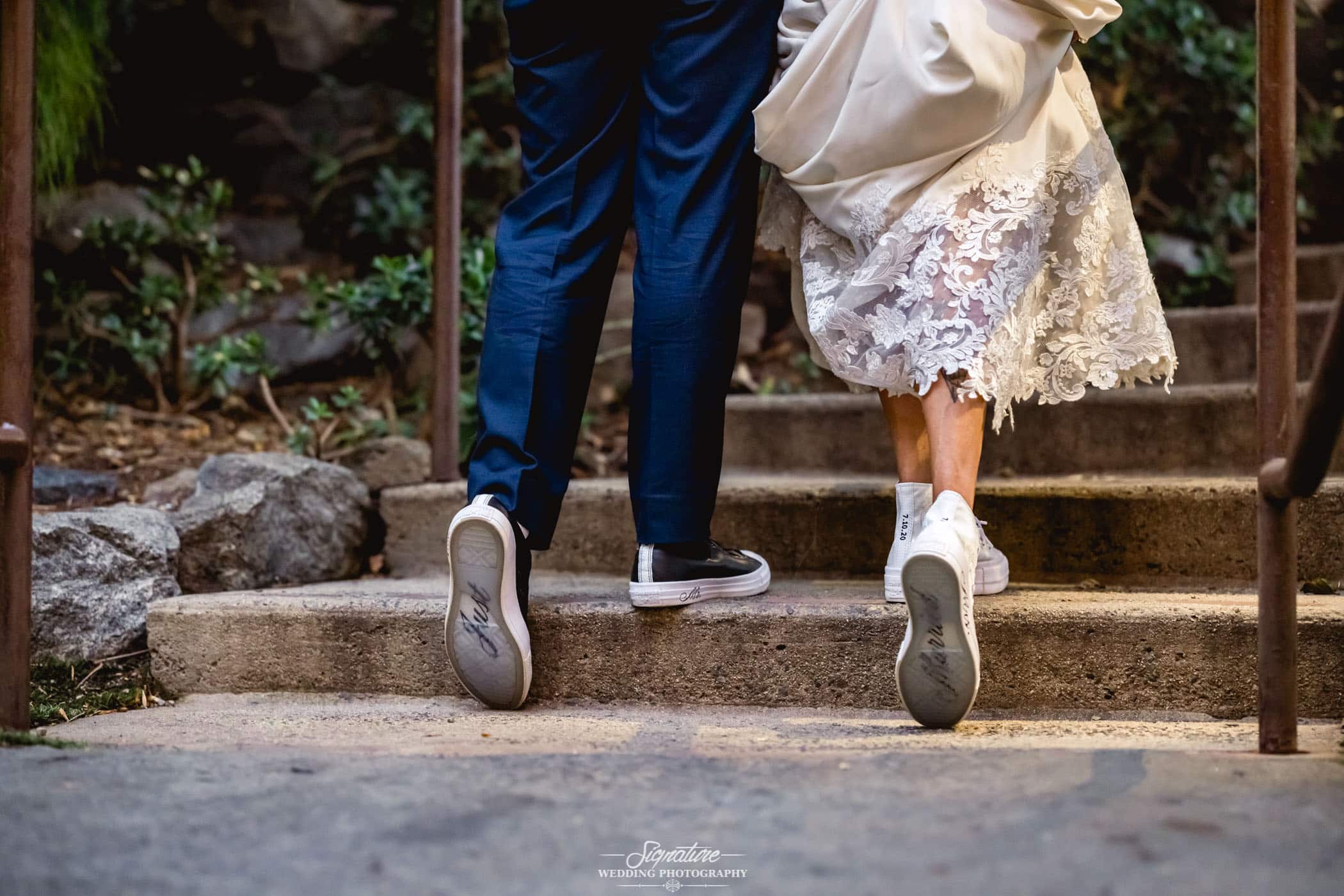 Bride and groom just married Converse