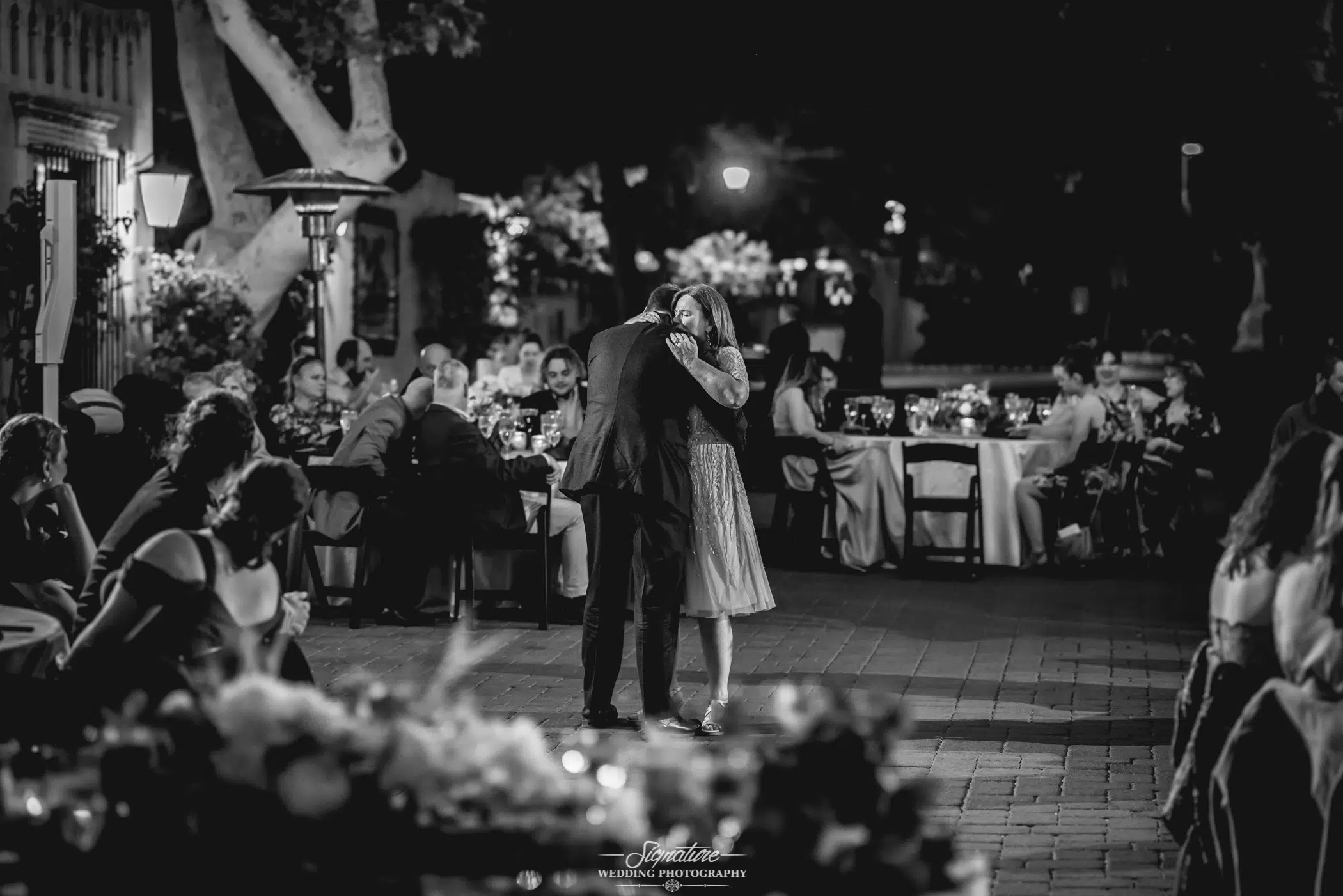 Mother and son dancing black and white
