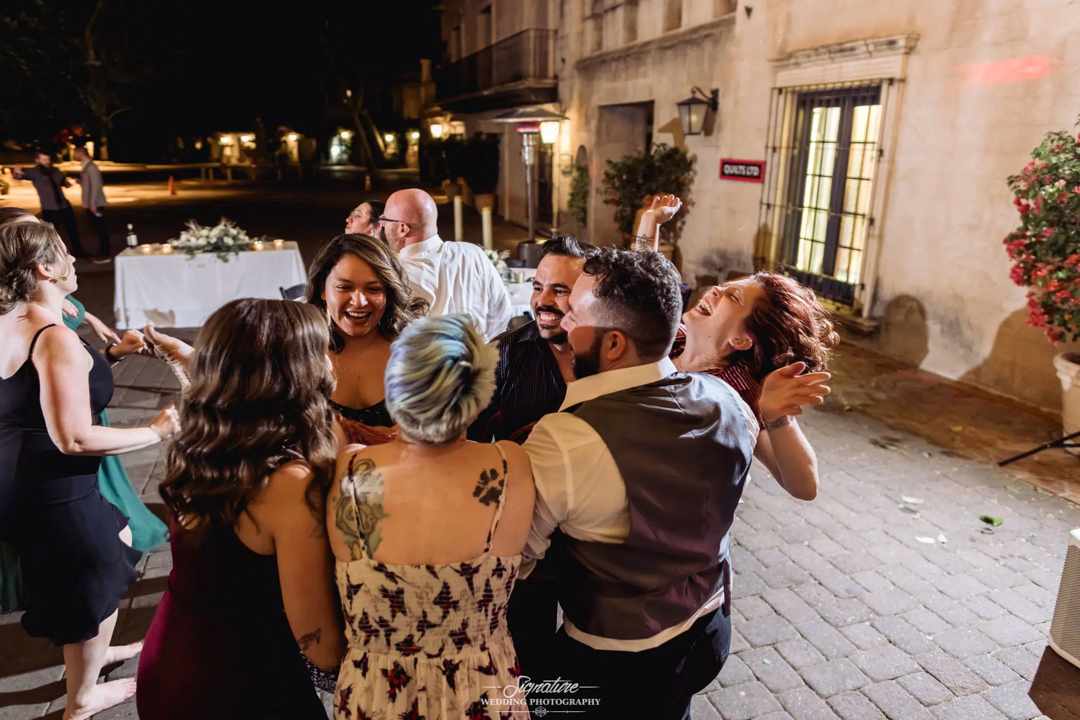 Wedding guests laughing together