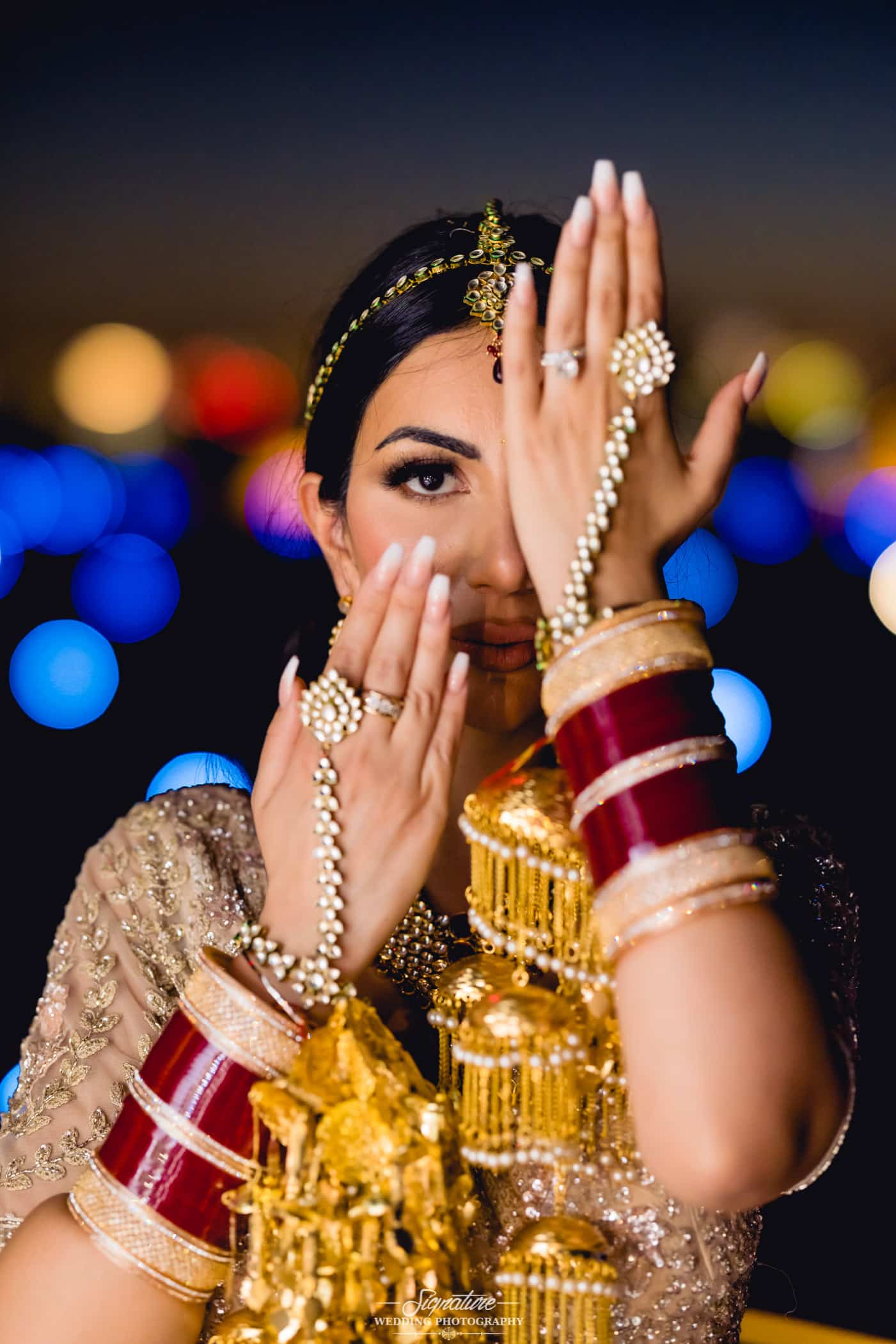 Indian bride with hand and arm jewelry