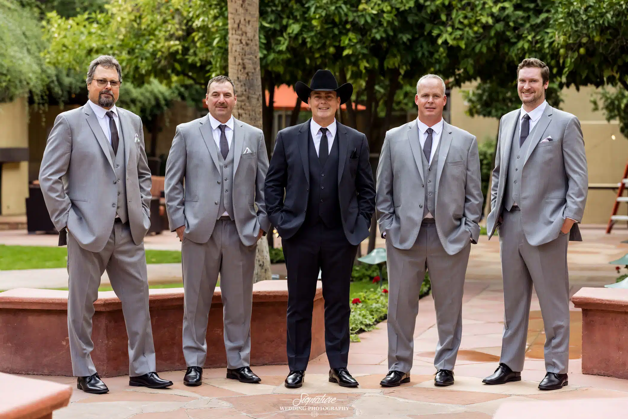 Groom smiling with groomsmen