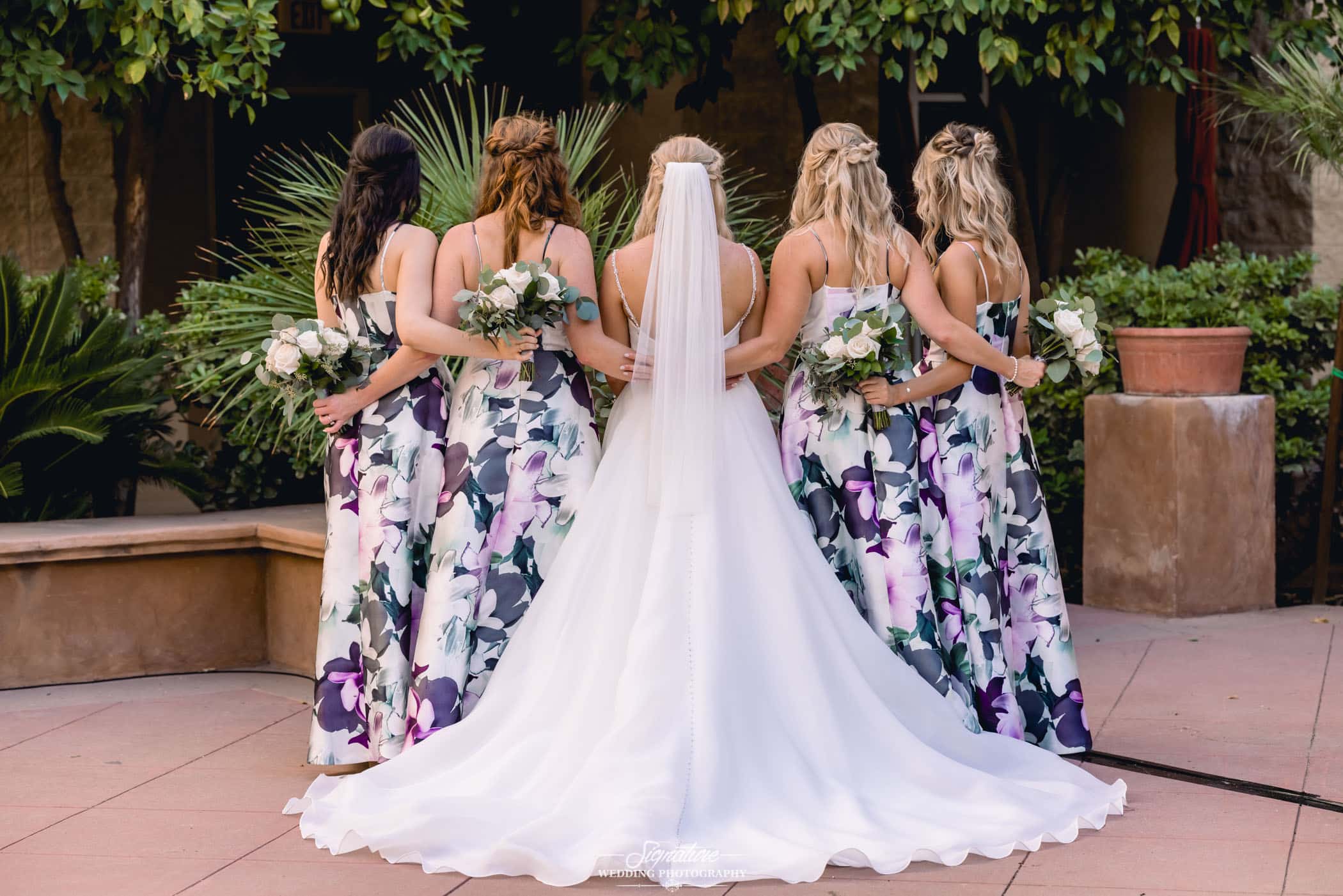 Back of bride and bridesmaids