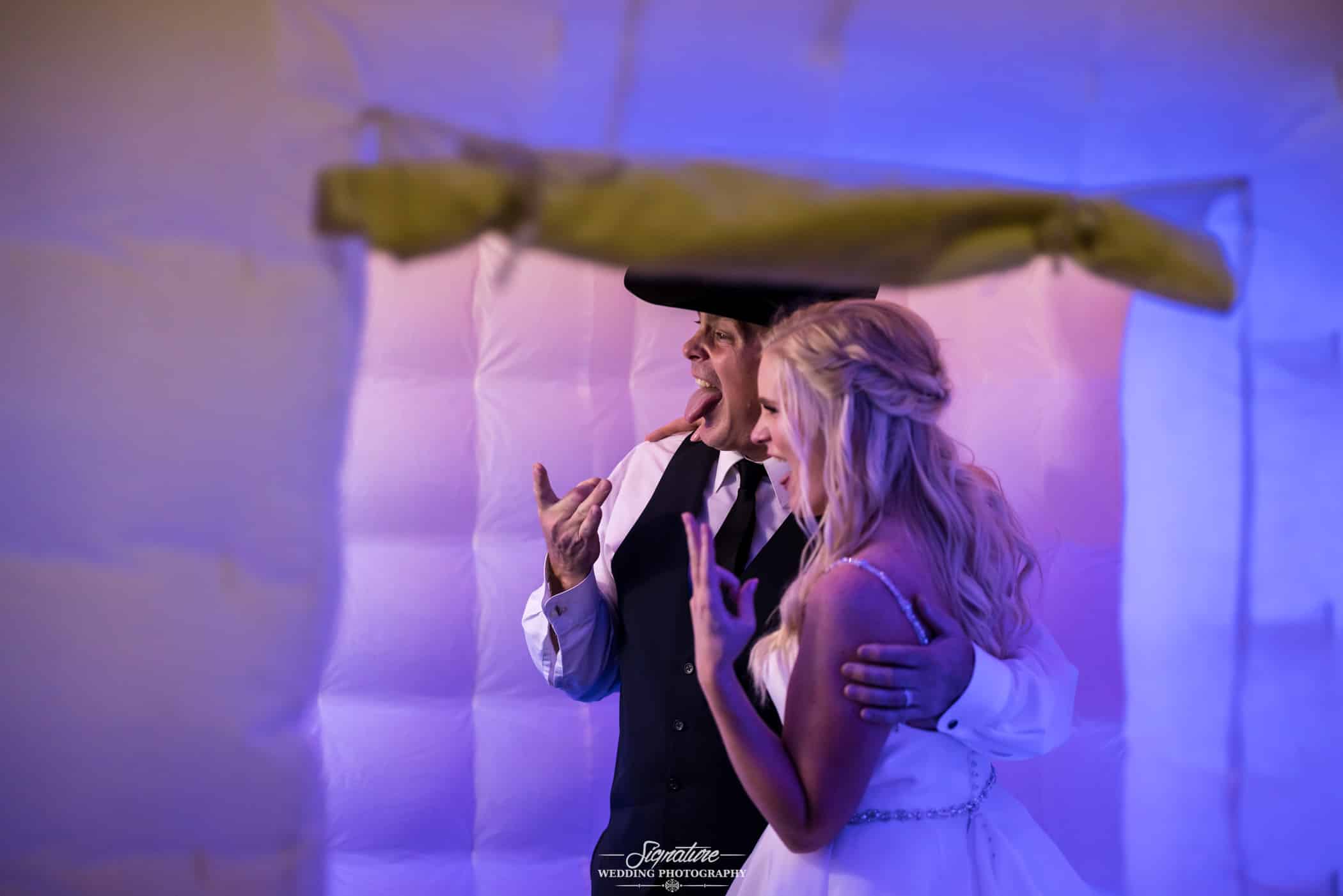 Bride and groom in photobooth