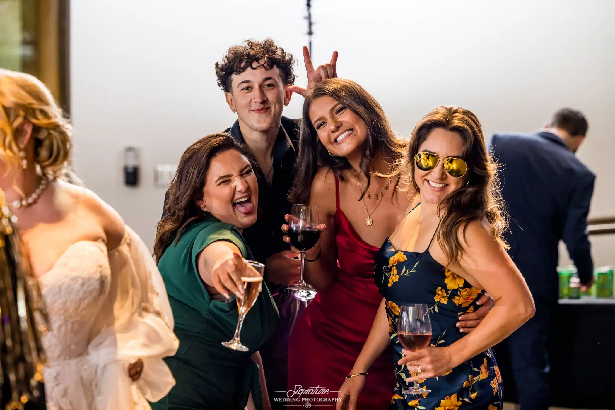 Wedding guests posing for camera