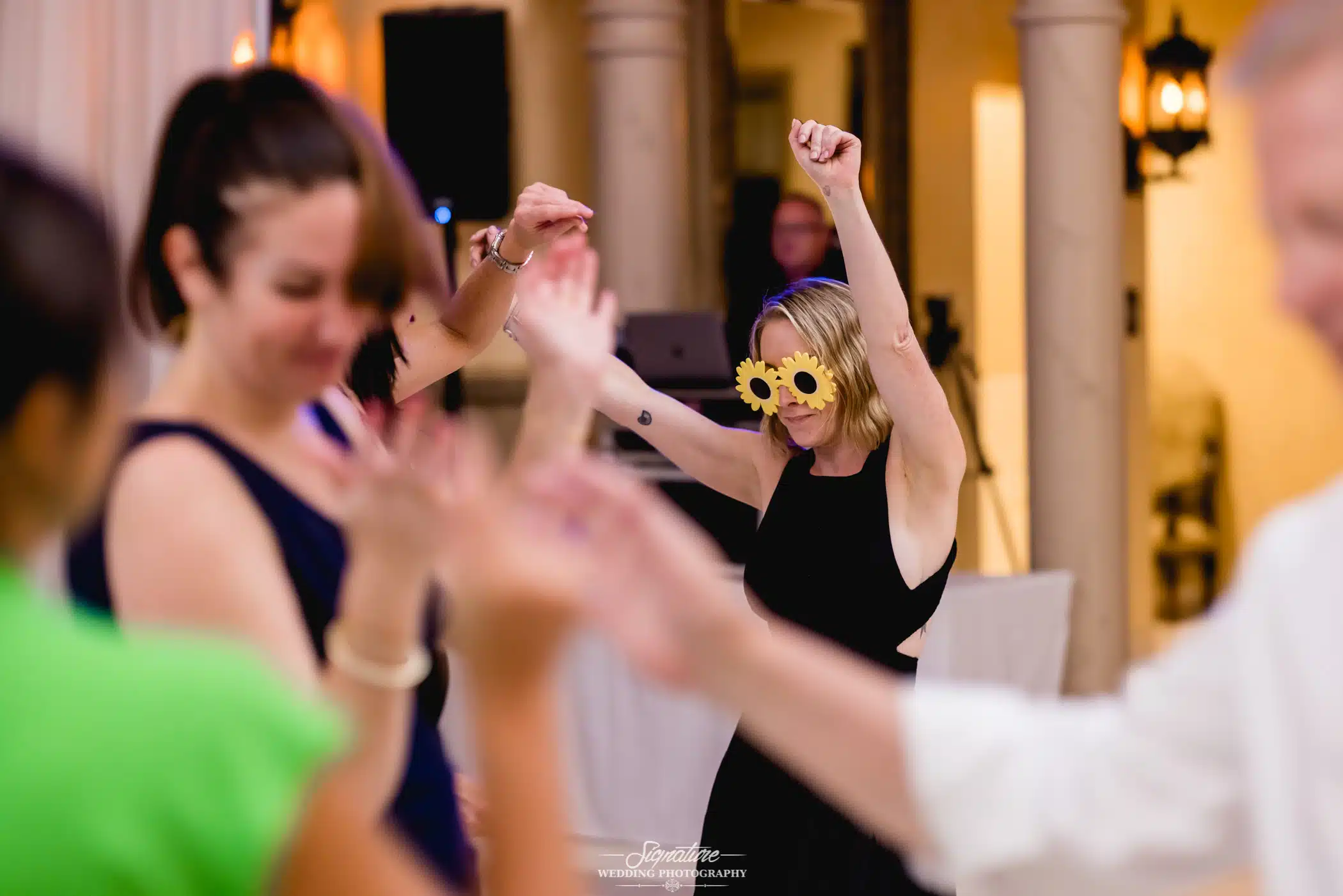 Wedding guests dancing