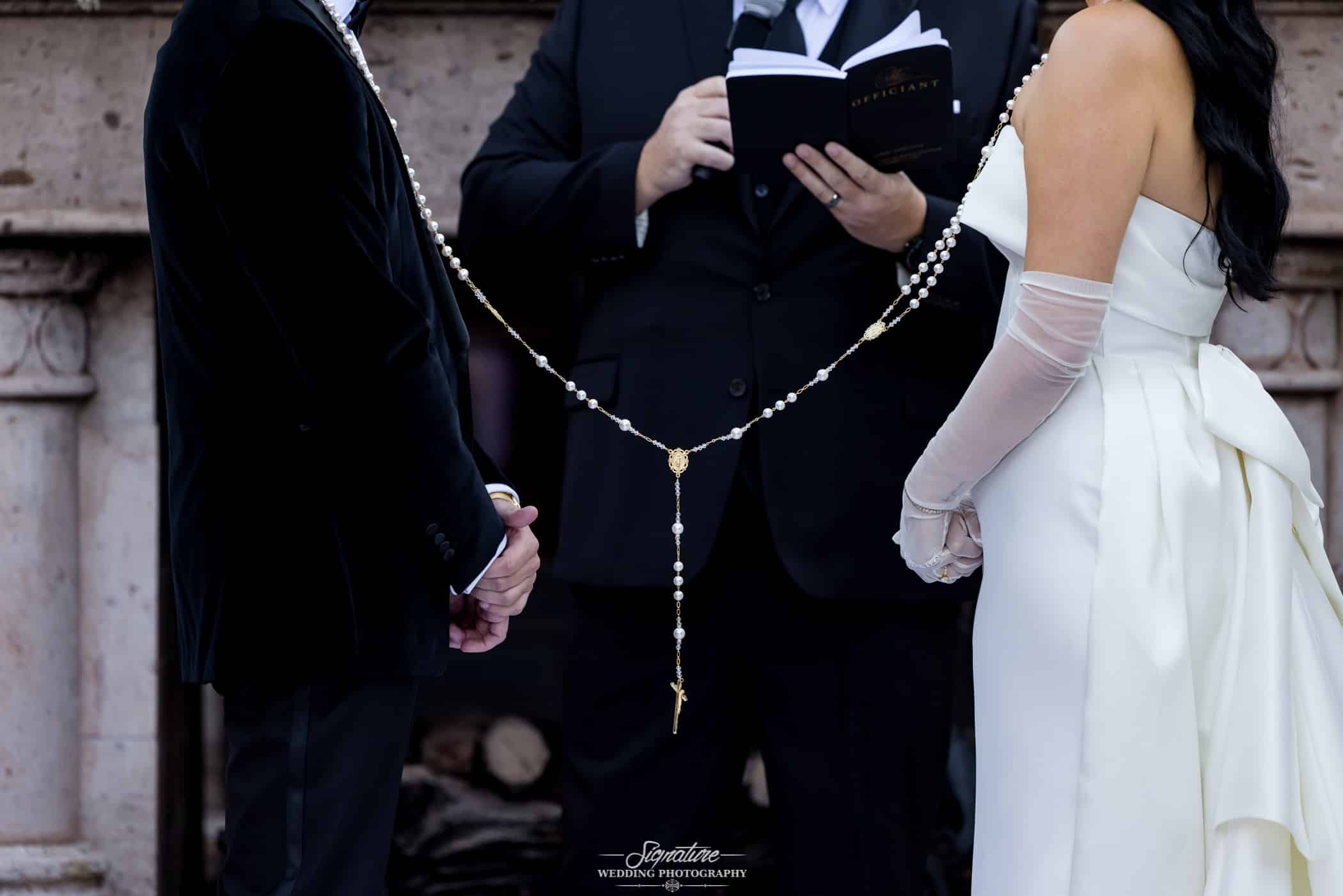 Bride and groom with rosary