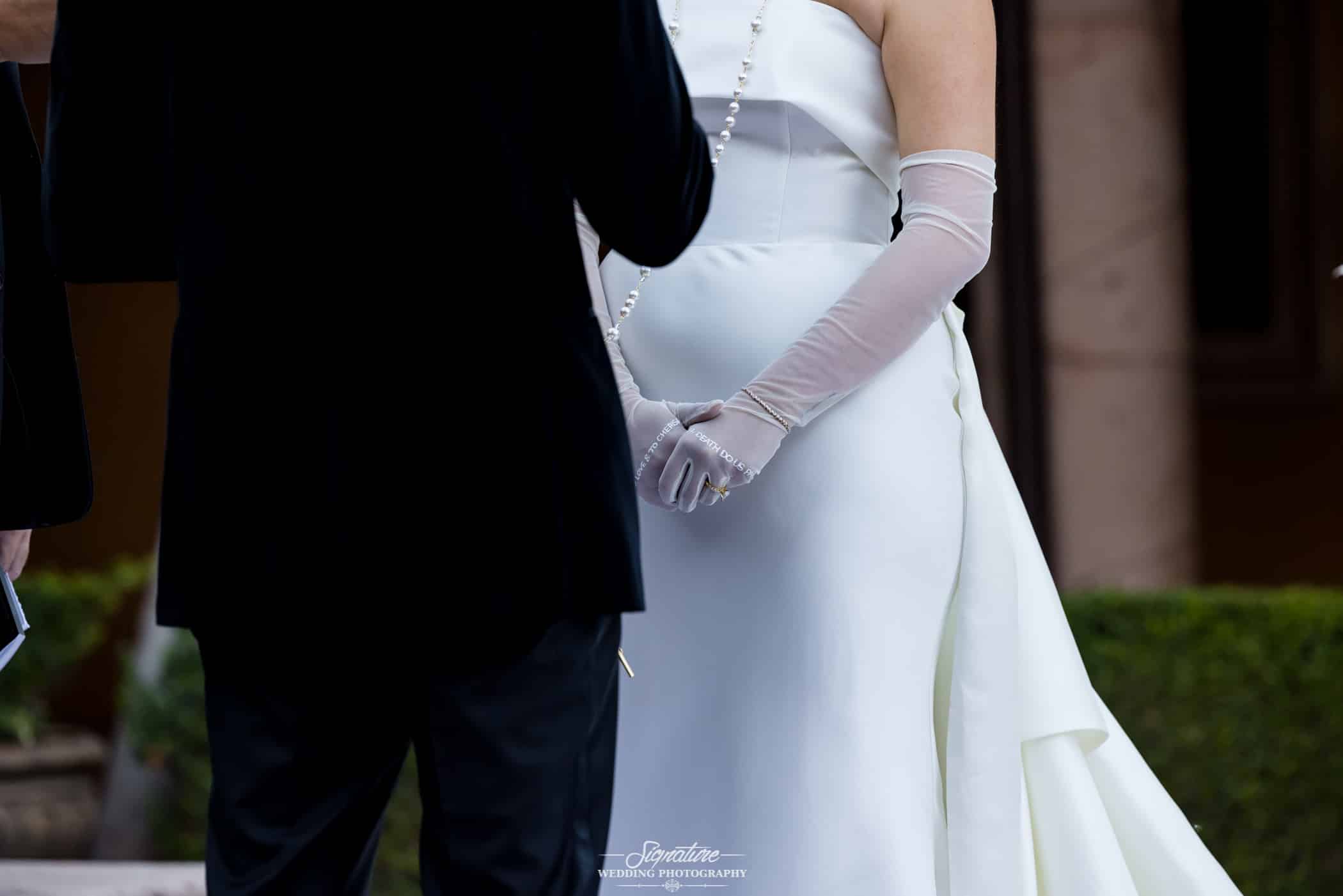 Bride's hands clasped during ceremony