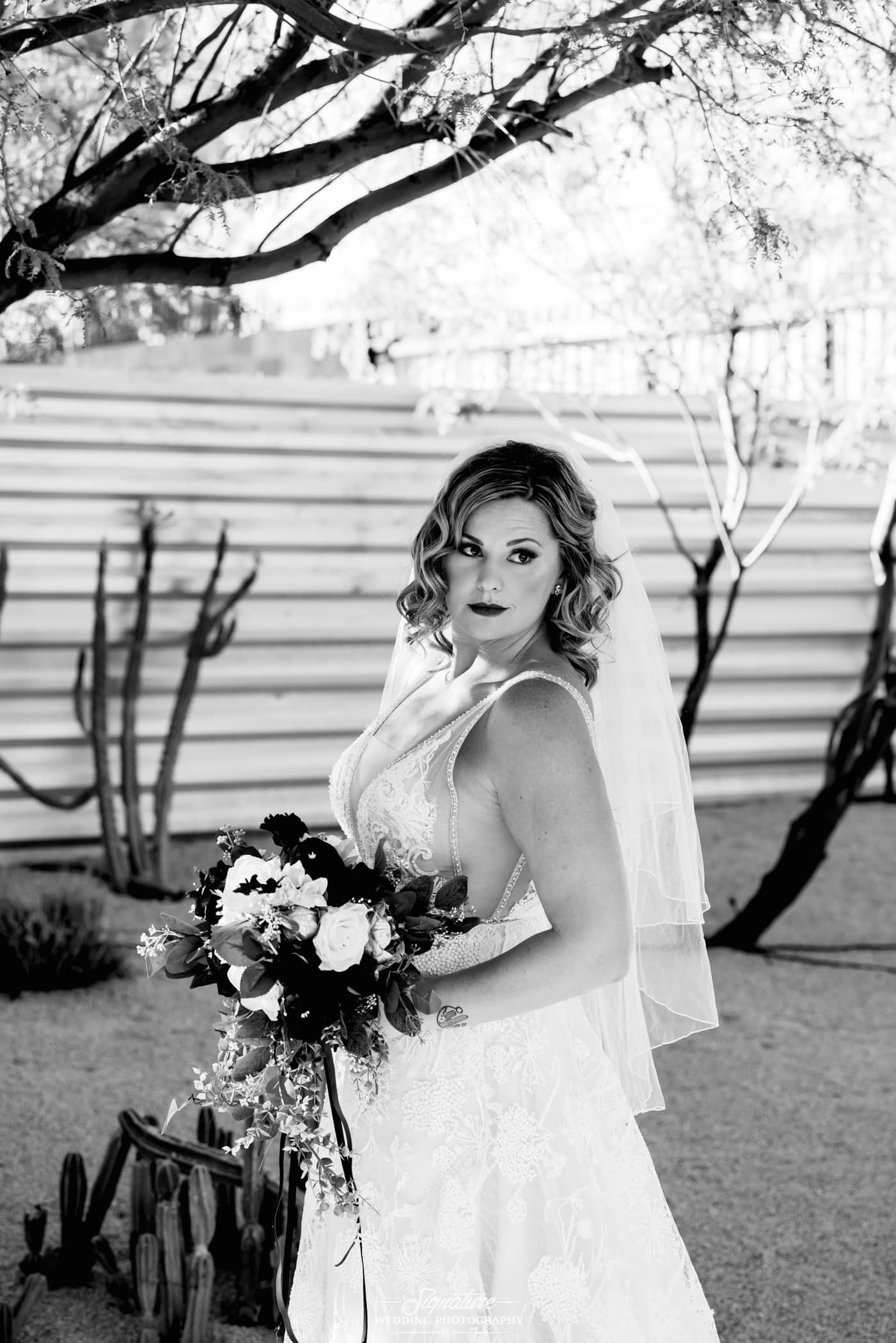 Bride looking off camera black and white