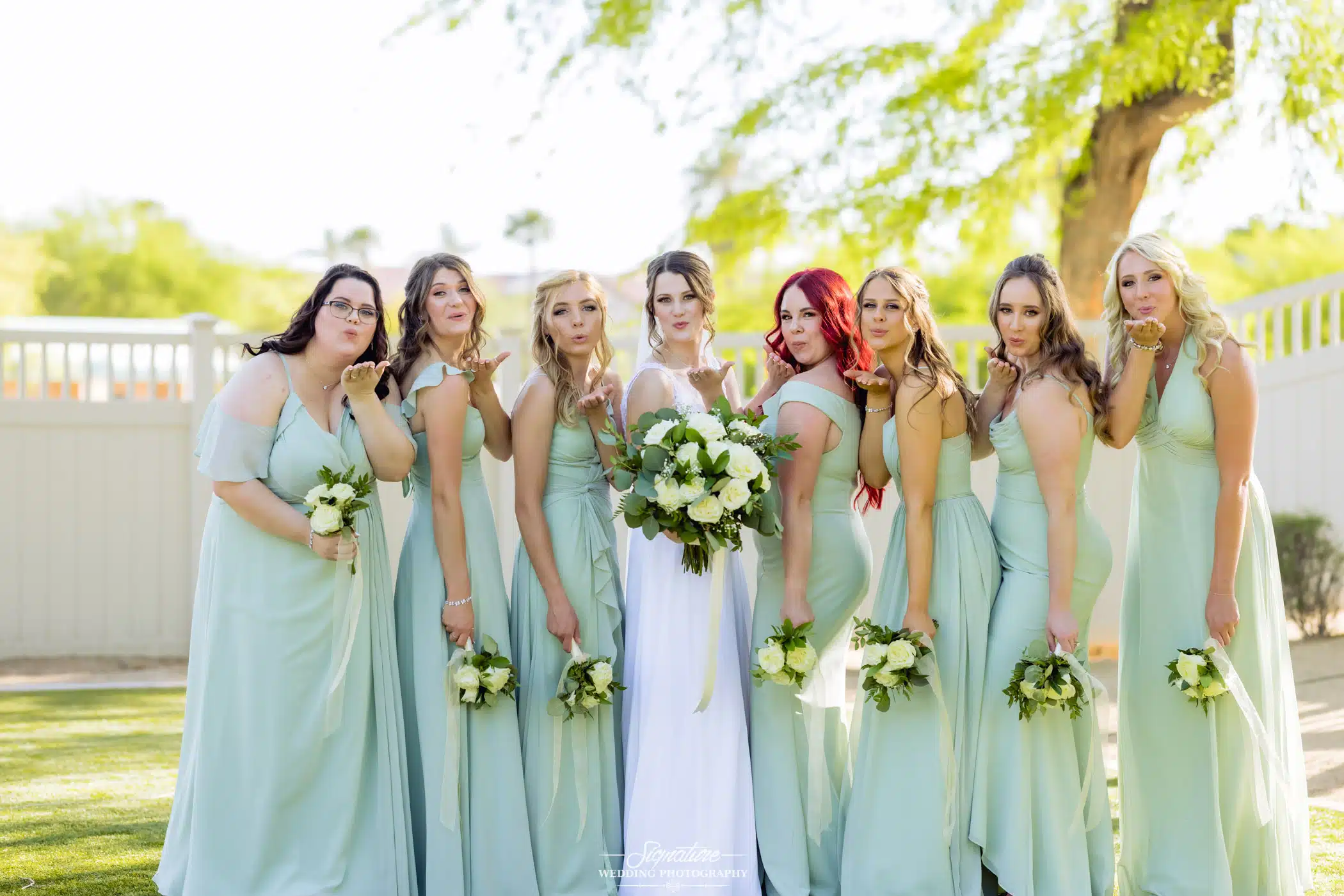 Image by Signature Wedding Photography Bride with bridesmaids