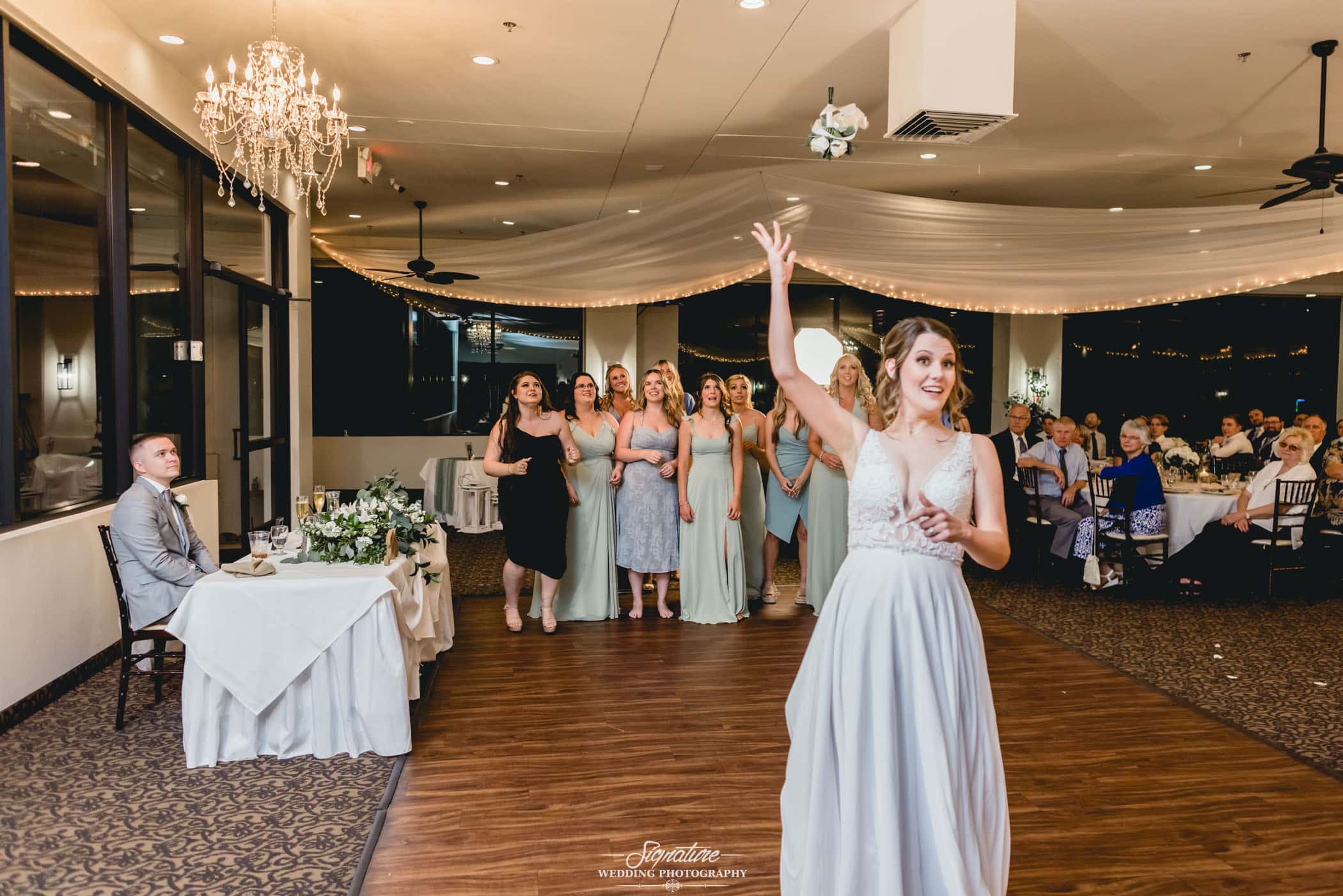 Bride about to do the bouquet toss
