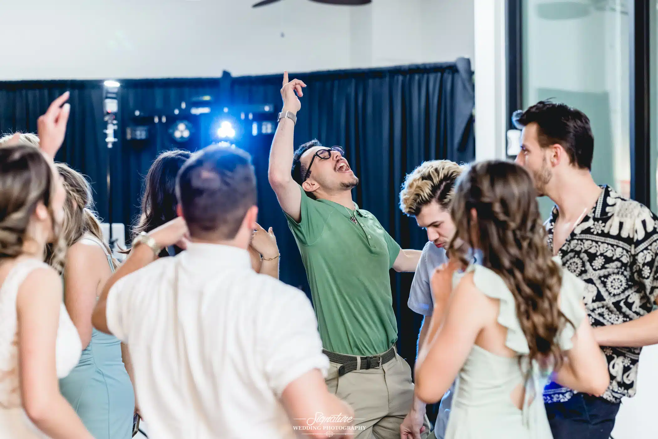 Image by Signature Wedding Photography Wedding guests dancing during reception