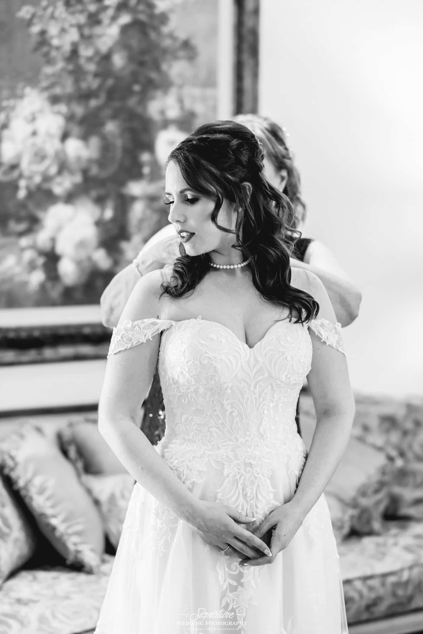 Bride looking off to side black and white