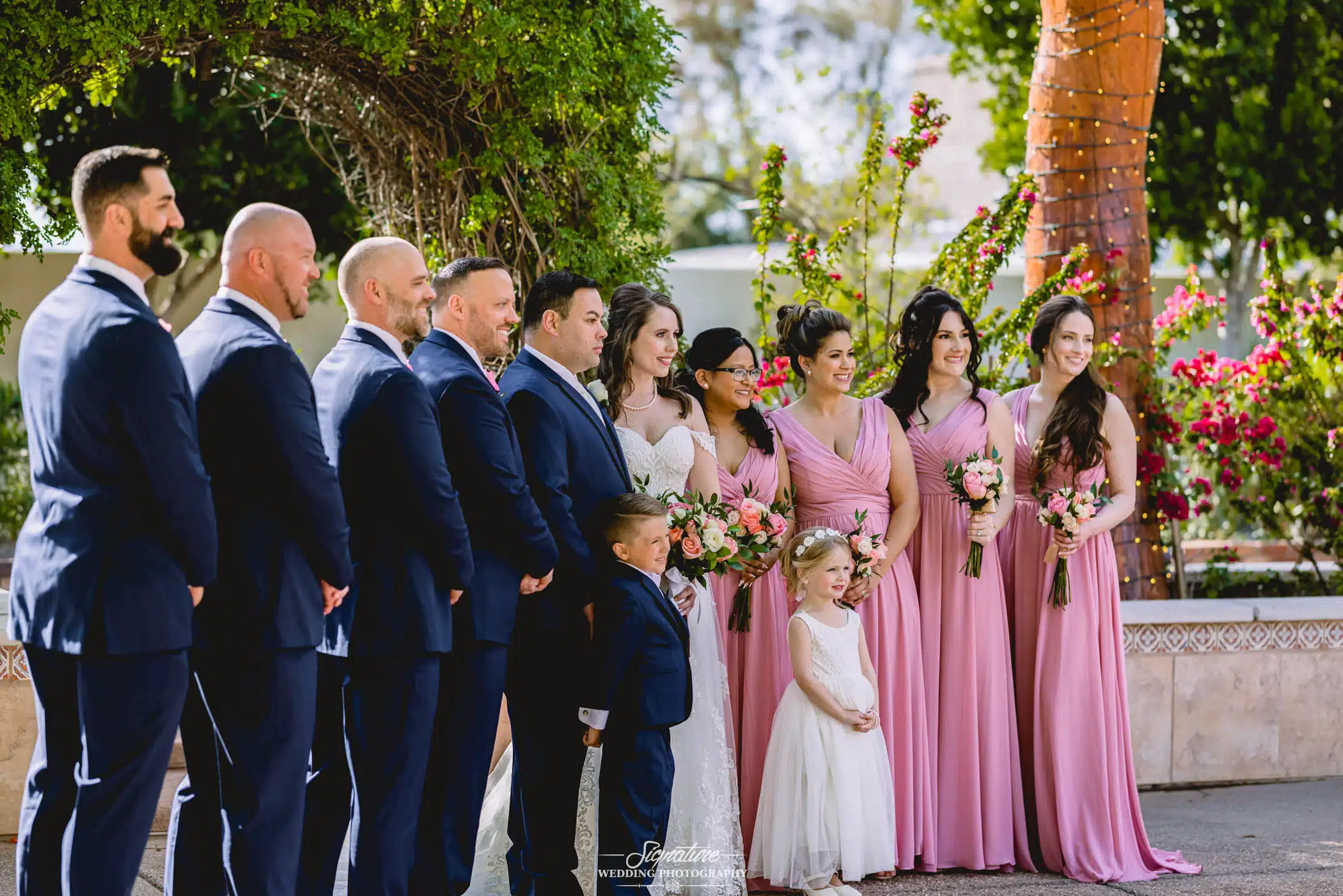 Image by Signature Wedding Photography Bride and groom with wedding party