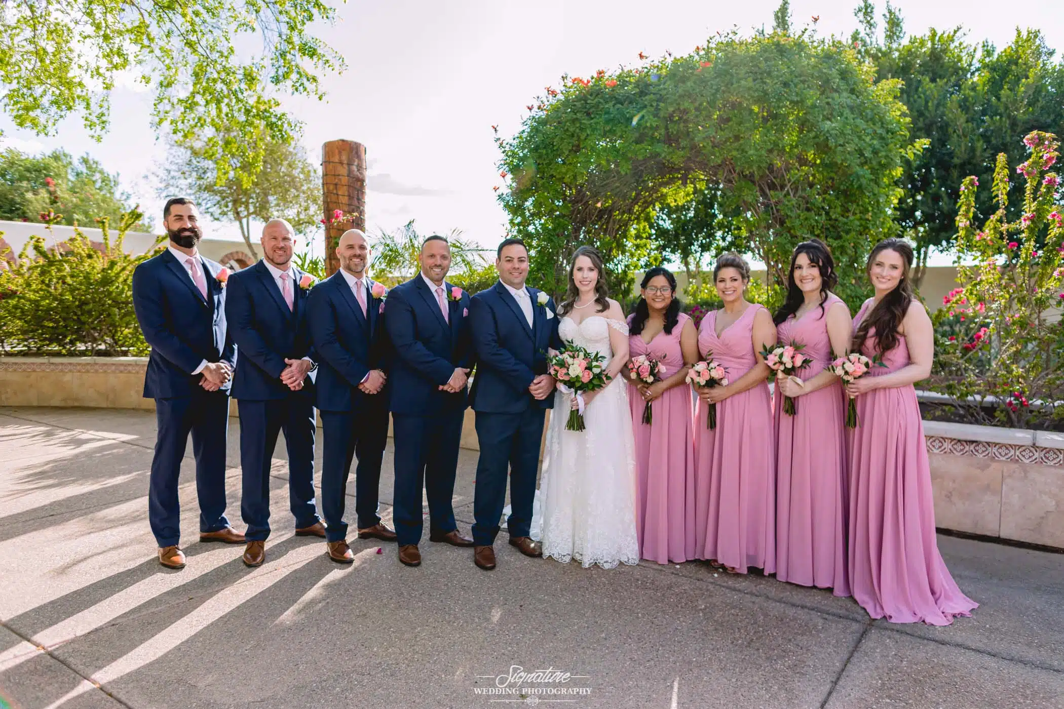 Image by Signature Wedding Photography Bride and groom with wedding party