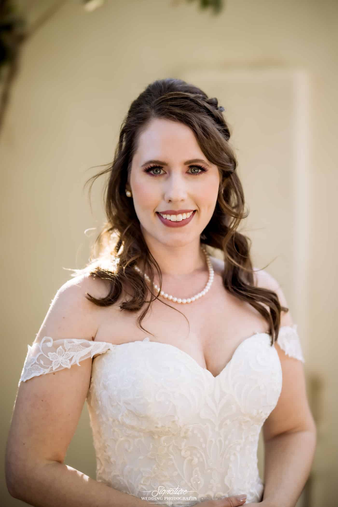 Bride smiling at camera