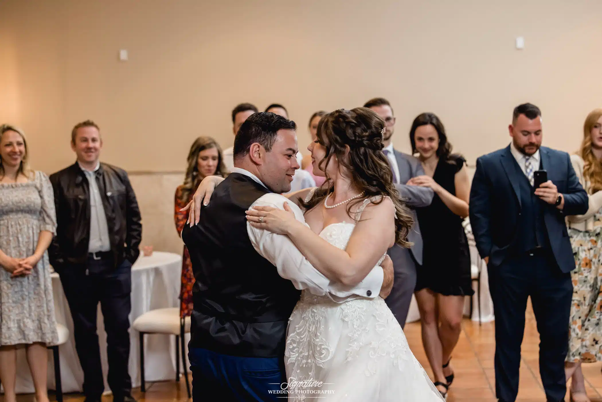Image by Signature Wedding Photography Bride and groom dancing at reception