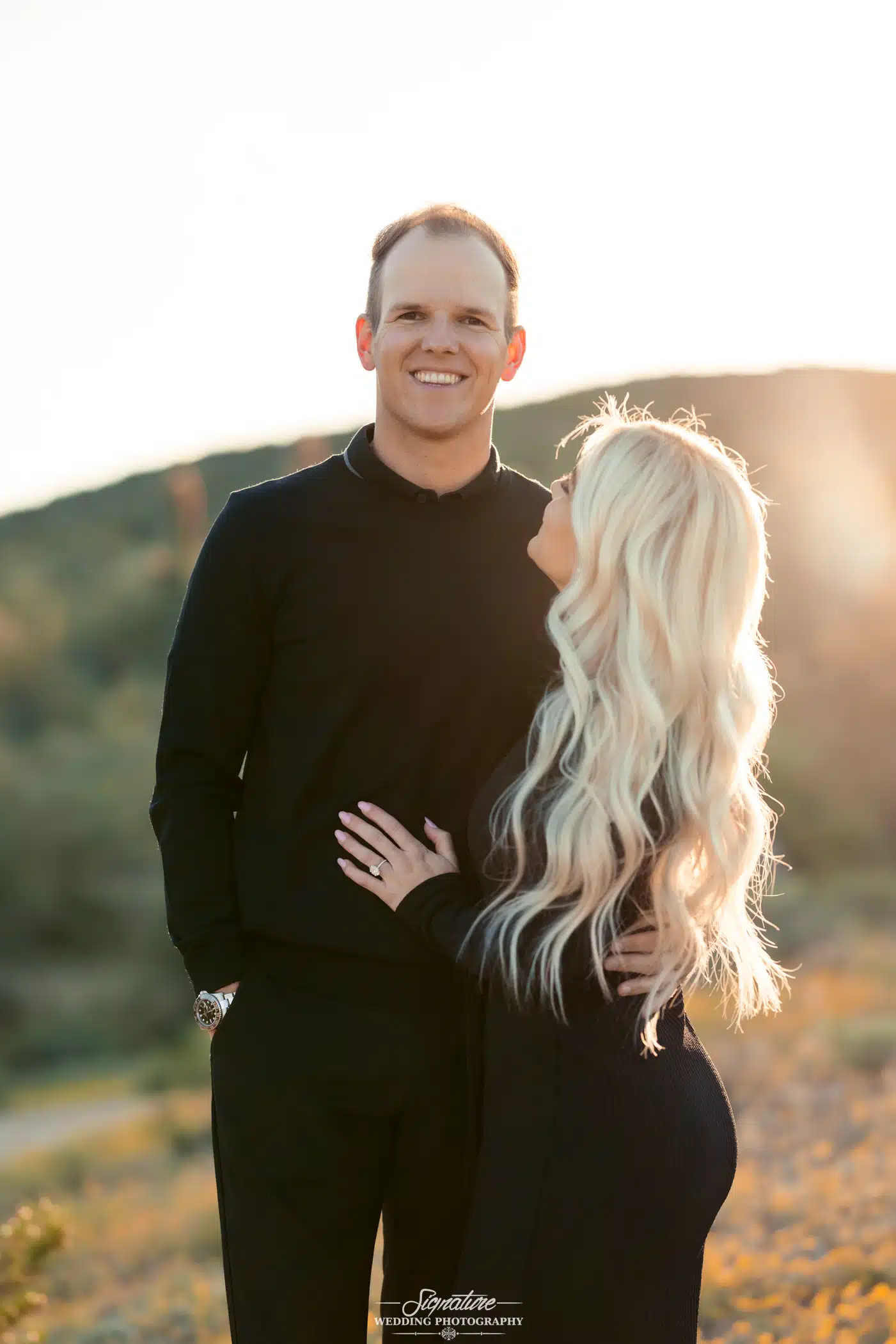 Image by Signature Wedding Photography Woman looking at man during sunset