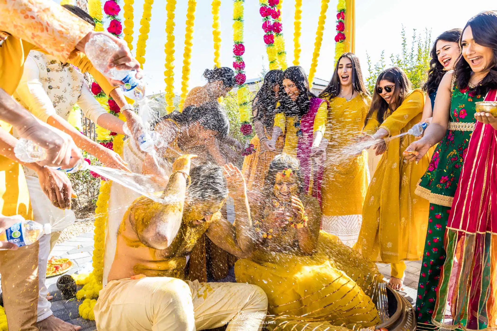 Image by Signature Wedding Photography Bride and groom at haldi ceremony