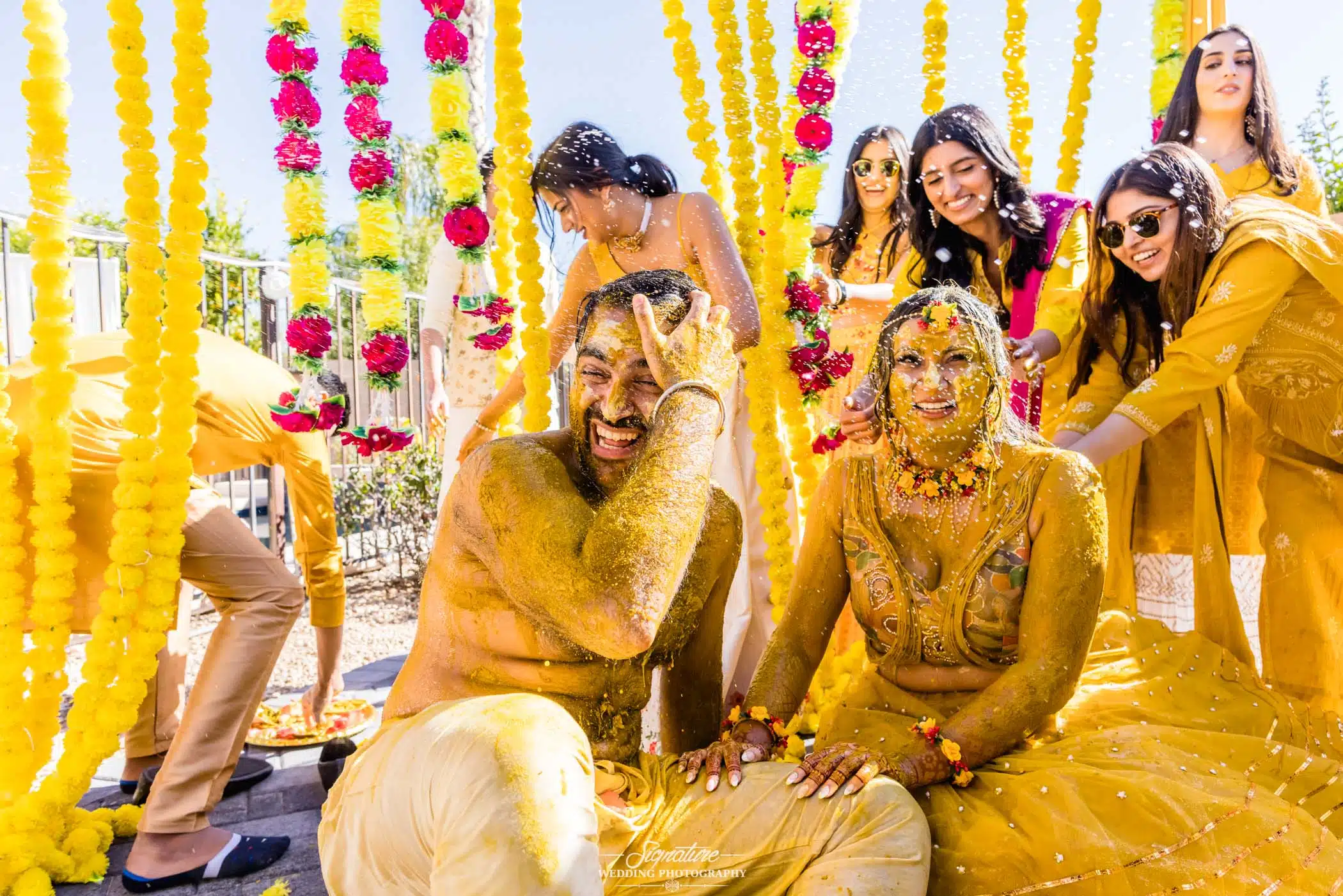 Image by Signature Wedding Photography Bride and groom at haldi ceremony