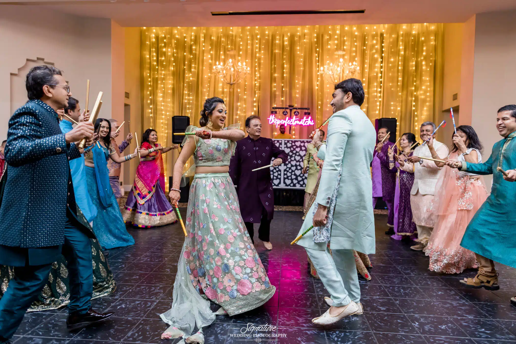 Image by Signature Wedding Photography Bride and groom dancing at reception