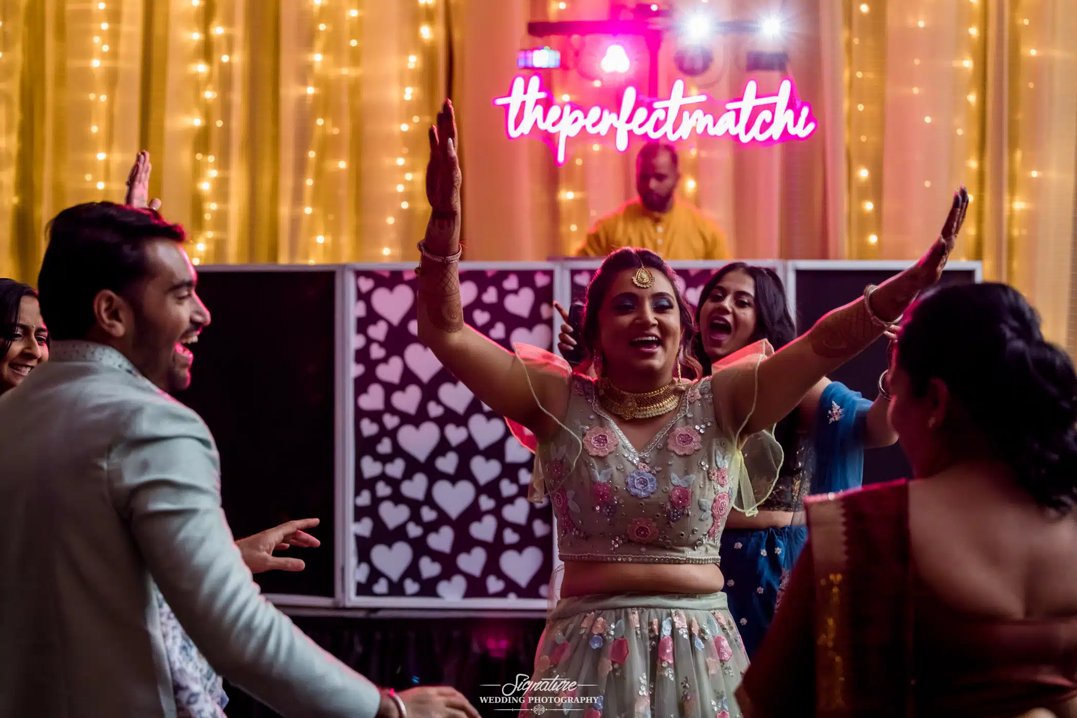 Image by Signature Wedding Photography Bride dancing at reception